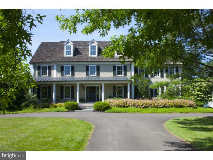 Silver Maple Farm is an exquisite example of a reproduction farmhouse surrounded by magnificent grounds that include open pastures, perennial gardens, a man-made pond and of course a "silver maple" tree-lined drive. Enter from the inviting "rocking chair" front porch into this sophisticated home. Attention to detail is evident throughout and includes; extensive millwork, many custom built-ins, gleaming hardwood floors and multiple sets of French doors. The lovely floor plan flows from room to room with beautiful light and views. The striking Kitchen is welcoming and extremely functional. Amenities include 6-burner Wolf range, Bosch dishwasher, wine cooler, Subzero refrigerator, several refrigerator drawers, large granite island that seats 5, tumbled marble backsplash, granite countertops, built-in microwave and warming drawer. The space opens to an all glass sunroom and breakfast room with wet bar and fireplace. The Family Room boasts charming window seats and wood-burning fireplace. Upstairs there are 3 large bedrooms with 2 full baths plus a light filled Master Suite which includes sitting room, full bath and walk-in closet. The sumptuous white bath has double vanities, a free-standing soaking tub and marble shower with dual heads. Outdoors you will enjoy relaxing in the pool or watching the sunset from the front porch. A wonderful country estate in the heart of Buckingham.