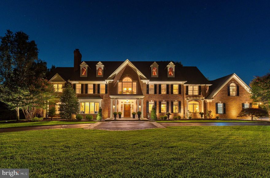 Welcome to one of the most beautifully sited and picturesque homes in Gwynedd Valley—perfectly positioned on a quiet private lane, set far away from any major roads. Privacy here is paramount, creating a serene sanctuary that’s increasingly rare in today’s market. This extraordinary residence underwent a full two-year transformation from 2007 to 2009 and has been meticulously updated ever since, maintaining a standard that rivals the pages of Architectural Digest. From the moment you arrive, the stately brick façade, covered front porch, and three-car attached garage set the tone for timeless elegance. A separate carriage house complements the main home, adding charm and versatility. Together, they provide nearly 8,000 square feet of living space on 2.23 acres of private, manicured grounds. The main home features six bedrooms, four full baths, three half baths, and a finished lower level. The carriage house is complete with a full bath, oversized two-car garage, generous storage, and a darling balcony overlooking the pool and expansive yard. Inside, every detail has been curated to impress. Gas fireplaces anchor both the formal living room and great room, adding warmth and sophistication. The Owner’s Suite is a true retreat with two walk-in closets and a spa-inspired bath. Multiple porches and outdoor living areas extend the home’s footprint, including a covered rear porch perfect for year-round enjoyment. Beyond, a classic kidney-shaped pool with generous decking sets the stage for summer entertaining, while a charming pool house conceals equipment and enhances the resort-like setting. The grounds are graced with specimen trees, lush landscaping, and a stone wall that adds both beauty and privacy. While this estate feels worlds away, its location offers effortless convenience—just minutes from regional rail, major highways, and the best of Montgomery County’s restaurants, boutiques, and schools. This is more than a home—it’s a lifestyle. With breathtaking design, luxurious amenities, and an unrivaled setting away from road noise and congestion, it stands among Gwynedd Valley’s most coveted offerings. Don’t miss the chance to make it yours. Call today to schedule your private tour.