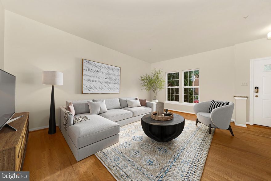 Welcome to this beautifully maintained brick-front townhouse offering space, style, and comfort in a convenient location! Step inside to gleaming hardwood floors throughout the main level and a bright, open layout perfect for everyday living and entertaining. The spacious living room flows seamlessly into the eat-in kitchen and dining area—ideal for hosting family and friends. The kitchen is a chef’s dream with granite countertops, stainless steel appliances, a tile backsplash, ample cabinetry, and generous prep space. Just off the kitchen, a cozy sunroom offers the perfect retreat to relax and unwind after a long day. A main-level powder room adds extra convenience. Upstairs, the spacious primary suite is filled with natural light and features a luxurious ensuite bath with dual vanities, a soaking tub, and a separate stall shower. Two additional bedrooms and a full bath complete the upper level—great for guests, family, or a home office. The fully finished lower level provides additional living space with a large recreation room or second living area. Step outside to a fenced-in yard—ideal for summer BBQs—and enjoy private parking with your own dedicated spots out back. Community amenities include a pool and more! Conveniently located near Route 26, Route 15, I-70, and a variety of shops and restaurants, this home truly has it all!