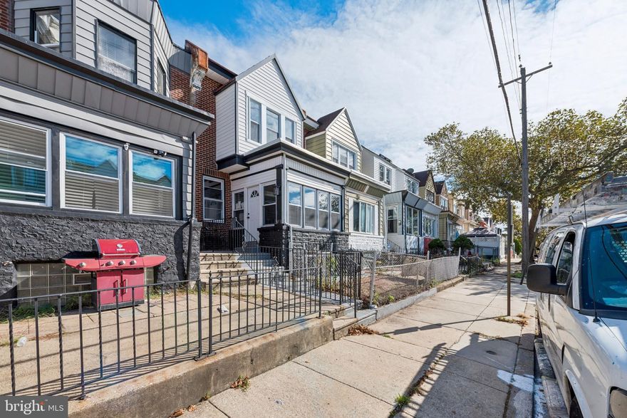 Make yourself at home in this gorgeously renovated Fern Rock twin within walking distance of nearby bus stations and the Fern Rock Transit Center! This beautifully modernized Philadelphia row home boasts 3 bedrooms, 1 and a half baths, off street parking, and ample closet space all brightly lit by generous natural lighting and newly installed recessed lighting throughout. The home features an absolutely gorgeous kitchen with brand new state-of-the-art appliances – refrigerator, garbage disposal, microwave, and oven - a massive island counter space, granite countertops, and new wooden cabinetry. In the basement you will find the highly convenient one car garage fitted with a newly installed automatic garage door opener. Upstairs are three spacious bedrooms, each with a ceiling fan, and a beautifully renovated full bathroom with an overhead skylight that provides ample natural light during the day as well as the second floor living area with stacked washer and dryer. The main bedroom features two huge closet spaces with sliding curtain doors. There is also a smaller but generously sized walk-in closet space off of one of the additional bedrooms. Make this gem yours today!