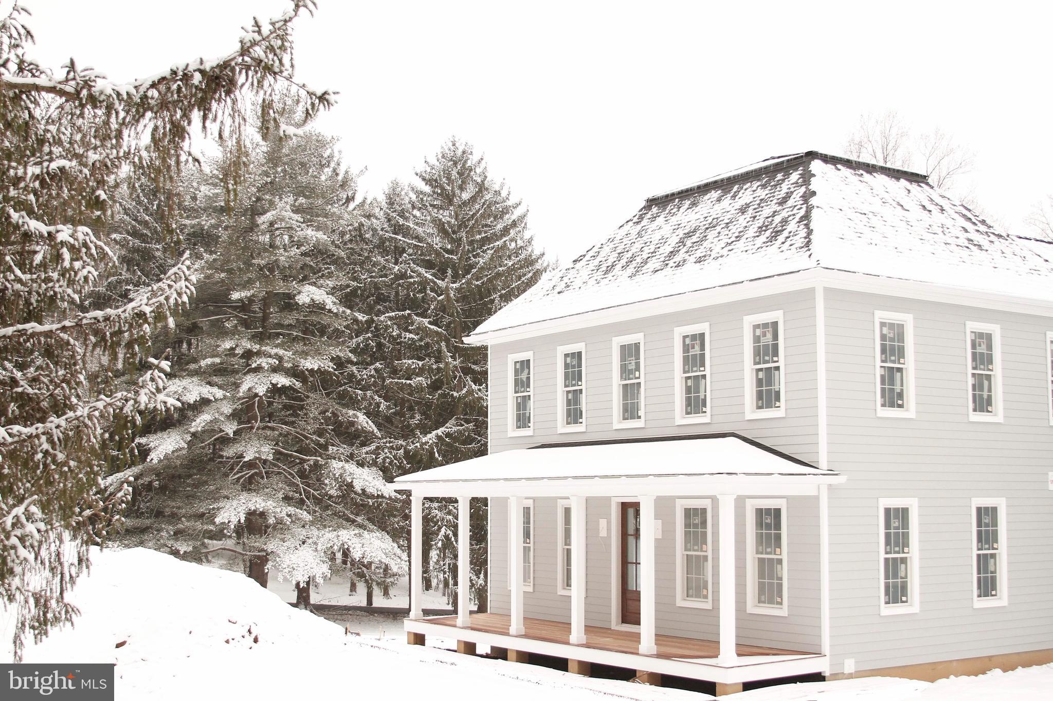 Rare find! One-of-a-kind, new construction home now available on quiet-cul-de-sac in the Downingtown School District, minutes from the Montgomery School, with a short drive to Malvern, West Chester, Exton, and King-of Prussia. This well-designed, functional 5 bedroom, 3.5 bath, 5000 square foot home is packed with features such as 10’ ceilings throughout first floor, 9’ second floor ceilings, hardwood flooring, 1 3/4” solid core interior doors, Baldwin hardware, coffered ceilings, custom trim, built-in window candles, and tons of natural light. Covered mahogany full front porch with beautiful mahogany front door leads to welcoming foyer flanked on either side by a large dining room and front room with French doors. Centrally located kitchen with large island, walk-in pantry and functional layout leads to living room with large wood-burning fireplace and wet-bar. Mud room trimmed with cubbies and hooks for large household organization adjoins the 3-car attached garage. Beautiful hardwood staircase leads to second floor crowned with a chandelier. Second floor offers a primary suite with gas fireplace and his and hers walk-in closets, ensuite bathroom with 2 separate vanities, heated floors and soaking tub, and separate water closet. 4 additional bedrooms, each with its own walk in closet, 2 full bathrooms, and a laundry room complete the well laid out second floor. The exterior offers plenty of yard space on this 1+ acre lot for entertaining, with the option to add a patio or deck. Stunning sunset views over deed restricted adjoining land are seen throughout the home, including the yard, main living areas and primary suite. Basement with 9’ ceilings and outside egress ready to be finished your way. Built with energy efficiency in mind, this home features sturdy 2x6 wall construction with r49 attic insulation and r21 wall insulation, Andersen windows, and multi-zone, high efficiency HVAC. Available for July 2025 delivery.