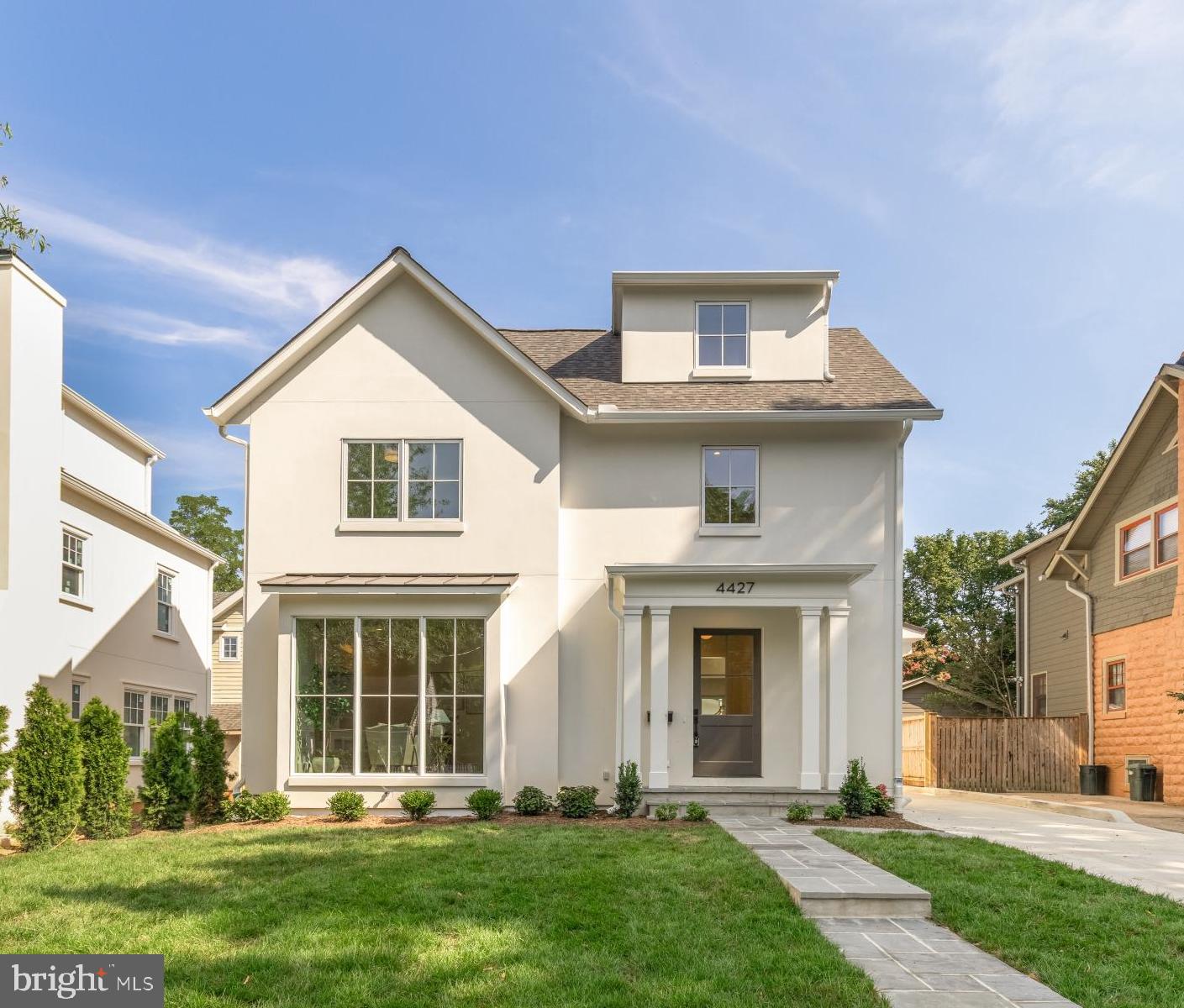 Welcome to 4427 Ridge Street, a stunning new construction home in the heart of the Town of Chevy Chase, brought to life through a prestigious collaboration between GTM Architects, Terra Innovations, and Castlewood Custom Builders. Blending classic charm with modern luxury, this four-level residence offers five bedrooms, four and a half bathrooms, and a detached garage with an EV charging outlet, all on one of the most desirable streets in the neighborhood.
The home’s curb appeal is immediate, with a stucco exterior, a natural cleft flagstone walkway, and a covered front porch, all of which lead into an interior defined by timeless design and exceptional detail.
The main level impresses with 10-foot ceilings, select 5” white oak flooring, and bright, open spaces that transition effortlessly from formal to casual living. The family room, anchored by a dramatic 42” Accelerator wood-burning fireplace with herringbone refractory lining, opens to a flagstone patio and covered rear porch, creating a seamless indoor-outdoor experience.
At the heart of the home, the gourmet kitchen is a showpiece, featuring Woodhaven custom inset cabinetry, sleek quartz countertops, and a premium appliance suite including a Lacanche 43.5” range, 30” integrated refrigerator, 24” integrated freezer, Bosch custom-panel dishwasher, and Sharp drawer microwave. A walk-in pantry offers ample storage—and is just waiting to be filled with favorites from Trader Joe’s, conveniently located just two blocks away. A sunny breakfast nook with views of the backyard and a formal dining room perfect for entertaining complete this level.
Also on the main floor, a versatile office/guest suite is tucked away for privacy, making it ideal for visitors or remote work.
Upstairs, the second level features 9-foot ceilings and a luxurious primary suite with dual walk-in closets and a spa-inspired bath complete with a soaking tub, oversized shower, and double vanity. Two additional bedrooms, a stylish hall bathroom with double sinks, and a laundry room designed for convenience round out this floor.
The third level loft offers flexible living space, another bedroom and full bathroom—ideal for a playroom, guest suite, or creative studio.
The fully finished lower level includes a generous recreation room, fifth bedroom, full bath, and dedicated home gym with rubber flooring, plus walk-up access to the backyard.
Every detail has been thoughtfully considered—from the Jeld-Wen Siteline casement windows that bathe the home in natural light, to the designer lighting throughout, and the quality finishes that define this extraordinary property.
Just blocks from downtown Bethesda, Metro, neighborhood parks, and top-rated schools, 4427 Ridge Rd is a rare opportunity to own a custom, architecturally significant home in one of the most sought-after neighborhoods in the region.
Schools:
- Rosemary Hills ES (PreK-2nd)
- Chevy Chase ES (3rd-5th)
- Silver Creek MS
- Bethesda-Chevy Chase HS
