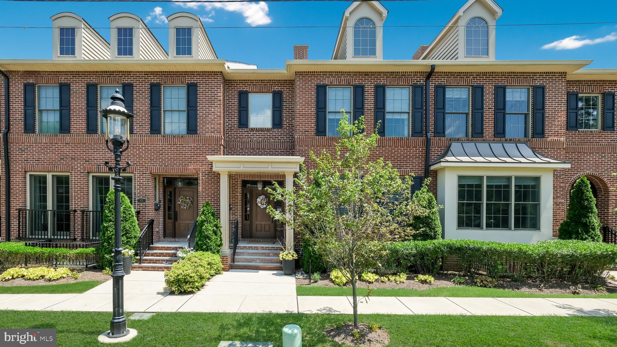 Welcome to "Ashland Walk," Boro Living at it's VERY best...this 6 year "new" 3-story brick townhome offers 3 spacious bedrooms, 3.5 stunning baths, 2 car garage (plus 3 parking spaces, 2 outside of garage and 1 in the lot) and...YES, we have an ELEVATOR! 3,636 finished square footage. Open floor plan, 9' ceilings, custom moldings, stunning wide-plank hard wood floors, Hunter Douglas remote-controlled blinds, recessed lights, sprinkler system....even the elevator was upgraded with wood paneling and recessed lights! Over $100,000 in upgrades! The open-concept kitchen, breakfast area and den is inviting, bright and airy featuring a gas fireplace with bluestone and shiplap surround, wood mantle and upgraded blower. Andersen sliders with transoms to the deck! Stunning gourmet kitchen with upgrades around every corner: quartz countertops, extra upgraded cabinetry offers great storage. Over-sized wood-stained island with quartz countertops offers extra storage, sink with disposal, dishwasher and breakfast bar! Monogram appliance package will impress, 6 burner range, sub-zero BI refrigerator and a fabulous "cafe-style" double-door wall oven! Appliances are 4 yrs old. Stunning marble tile backsplash and you've got a pot-filler over the range! Note the undermount lighting and hidden outlets and the fabulous Butler's Pantry with glass-front cabinets, marble back splash, sink and wine fridge! This is the perfect "Cook's Kitchen!" Lower level offers upgraded luxury vinyl tile flooring, recessed lighting, spacious rec room with alcove area, lots of closets/storage space, newer full bath with stall shower, entry to finished garage and egress to rear parking area. Upstairs you will find 2 spacious and sunny bedrooms with ample closet space each having custom designed closet organizers. Even the upper floor laundry room was customized with cabinetry and you'll love the high-end Electrolux washer & dryer that is included! Hall Bath with wood vanity, custom tile floor and tub/shower combination. The incredible Primary Bedroom suite was designed for comfort and convenience with luxurious w/w carpeting, tray ceiling with custom molding and fixture and silhouette blinds on the windows. The closet space is over-the top.....2 incredible walk-in closets with amazing custom design systems like you will not find anywhere else! Enter the Primary Bath and you will feel like you are in a 5* resort with the marble radiant heat flooring and oversized stall shower, soaking tub, oversized vanity with quartz counter tops and more! This impressive Boro home has the WOW factor! Short walk to Doylestown's shops, restaurants, museums, the theater, the library, the transportation center and more!