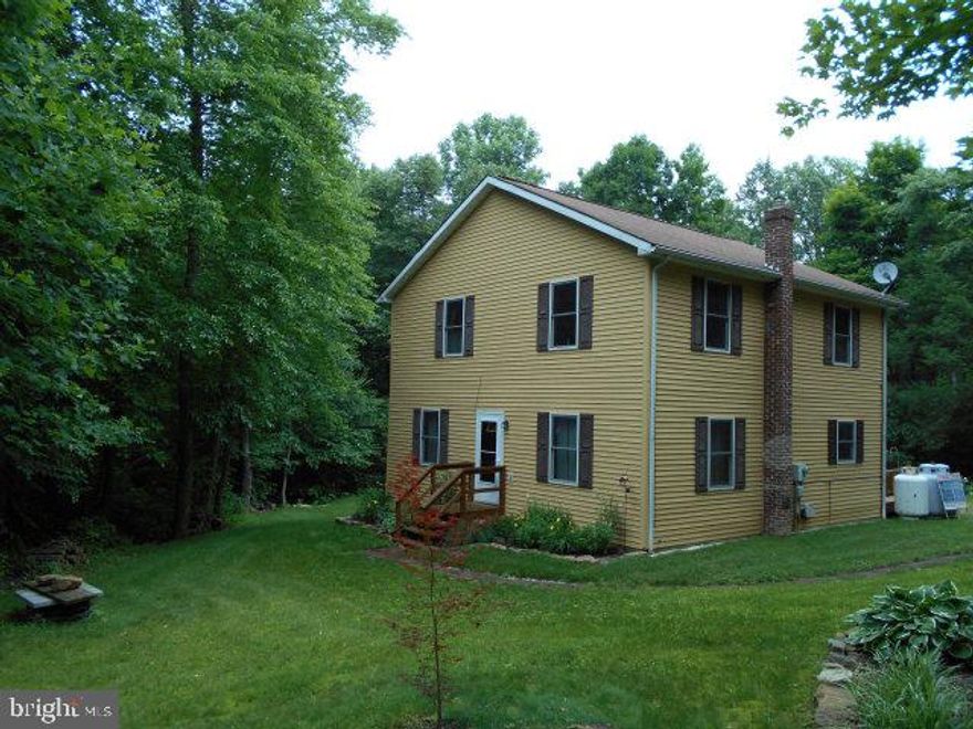 2 story home on 10.5 acres. In Clean & Green.