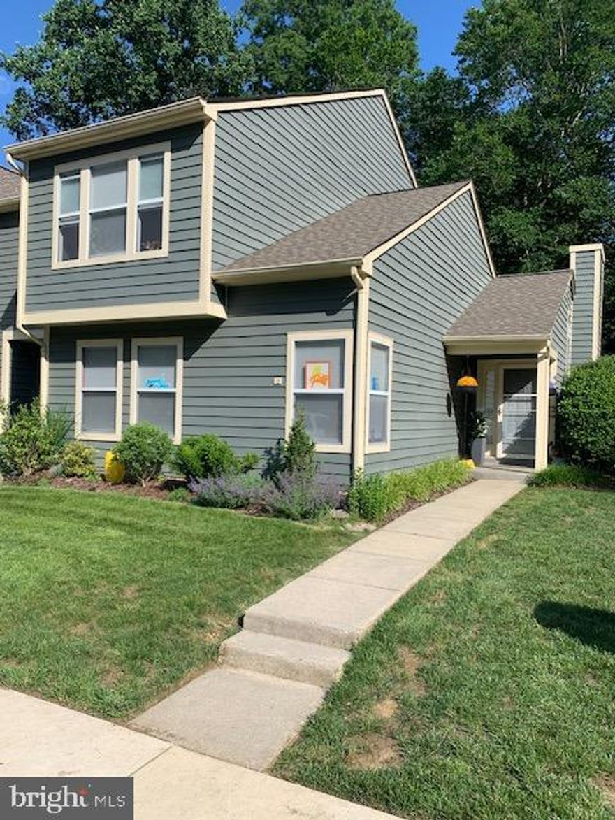 Coming Soon - on market date pushed back one week.
 Highly sought after Hunt Meadow, end unit townhome with main floor master suite! Tastefully updated w/ fresh paint, engineered hardwood floors & high-end kitchen renovation. Wall removed between kitchen and living room to create a lovely open floor plan enhanced by modern, open railing system on stairs to upper level. 2 more bedrooms upstairs plus a stunning full bath with walk-in shower and double vanity. 
Fenced rear yard, assigned parking, community pool, tennis, basketball and walking trails. Just 3 miles from historic, downtown Annapolis & Eastport where you can enjoy a multitude of musical, cultural and water-oriented activities.