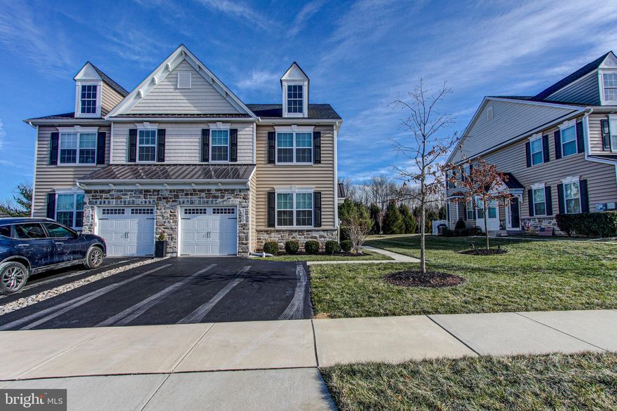 Welcome to this turnkey 3-year young twin carriage home in the desirable Colebrook Community. This three-year-old twin is move in ready with a lot of improvements since the owners purchased it.  As you enter the side entry front door, you can appreciate the beautiful luxury vinyl plank flooring that is showcased throughout the main living area as well as upstairs.  It is accentuated by a professionally installed staircase.  The first floor is an open floor plan where you have multiple living spaces to utilize.  The beautiful gourmet kitchen includes white wood cabinetry, stainless steel appliances, a tile backsplash and granite counter tops and an island with seating. The open layout of the dining room, kitchen and family room allow the gas fireplace to be enjoyed from any of these rooms.   Optional rooms on the main level, include the first-floor study with French doors and a vaulted coffered ceiling sunroom with a sliding door that leads out to a wood deck area that overlooks open space and access to a paved walking trail.  A beautifully tiled powder room completes the main living area.  As you go up the solid stained oak stairs you see a continuation of the luxury vinyl plank flooring throughout the second floor.  The master bedroom suite offers a vaulted ceiling, two large walk-in closets and a luxurious tiled bathroom with double sinks, a tiled oversized shower stall, and a linen closet. There are two additional generously sized bedrooms with ample closets that share a full bathroom that is located in the hallway.  A conveniently located laundry room completes the second floor.  The fully finished basement has an egress window, beautiful luxury vinyl plank flooring, professionally installed WIFI capable audio/visual system, a back-up battery powered sump pump and two storage areas.  The one-car garage and two car driveway parking make coming home a pleasure without worrying about where to park.  This home is close to shopping, entertainment and access to major commuter routes.  It’s also located in the highly rated Central Bucks School District! Make your appointment today!