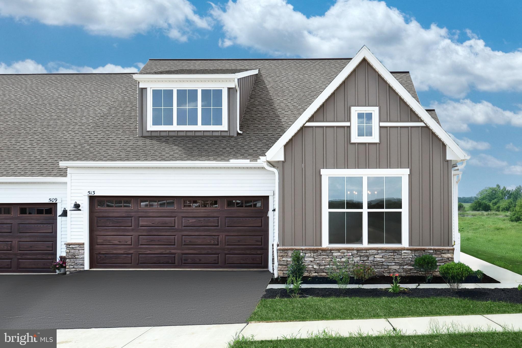 Limited-time offer: Save $10,000 on this home, only available for the next 3 Winding Creek Duplex buyers. Landmark’s new duplex at Winding Creek 55+ is a thoughtfully designed 1-story home with 2 bedrooms, 2 full baths and a 2-car garage. The private side entry opens to the foyer and a formal dining room. The kitchen is well-equipped with stainless steel appliances, quartz countertops, a tile backsplash, and a large pantry. The great room features a cathedral ceiling with wooden beams. Both bedrooms are tucked quietly to the back of the home. The owner’s suite has an oversized closet and a private bathroom with a tile shower.