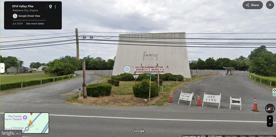 Family Drive-in Theatre is presently leased to an out-of-state tenant.  The current lease expires on December 31, 2025.  The current tenant has a provision in their lease for a thirty (30) day first right of refusal.  Once a contract to purchase is received, the current tenant has thirty (30) days to match the pending offer.
The present zoning is Frederick County B-2 – General Business District.  The land area consists of 10.16 acres or 442,570 square feet.  There is an existing concession building/snack bar with two projection rooms.  The floor area of the subject building is 1,686 SF.  There are two existing drive-in theatre screens.  Screen 1 is 84 ft. by 60 ft.  Screen 2 is approximately 50 ft by 35 ft.  There are 380 drive-in speakers on 4 ft. poles with 2 speakers per pole.  There is an existing children’s playground.  The existing digital projection equipment is owned by the current theatre operating company with headquarters in Texas.  A new purchaser who is interested in operating the drive-in theatre would need to invest in the very expensive state-of- the-art digital projection equipment now required to screen all movies.