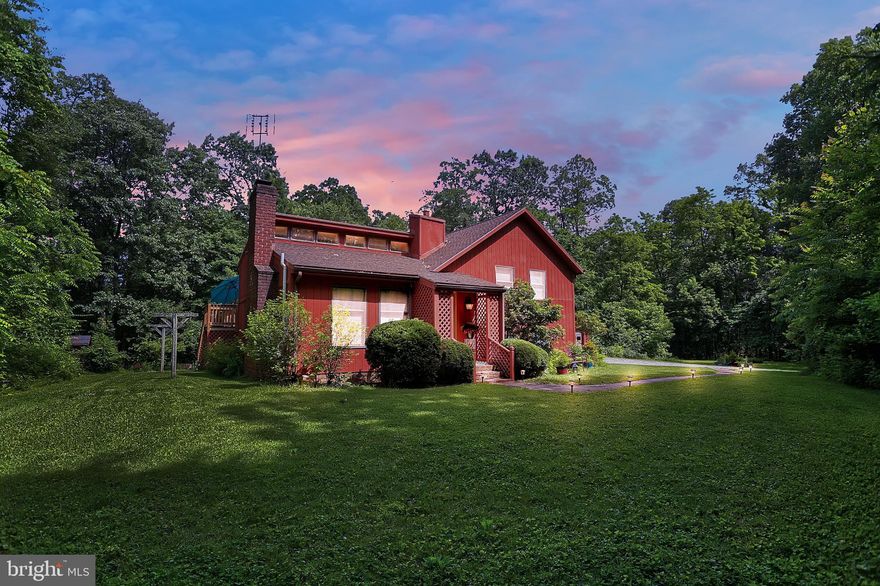 If you are looking for a well-maintained home in a secluded location this is it! Imagine sitting on your back deck after a long day and enjoying a nice cold drink and watching the wildlife go by.Perfectly nestled on 3.15 wooded, tranquil acres in Gettysburg, this beautiful home offers many opportunities. Perfect for year-round living, weekend getaways or Airbnb (without the Gettysburg restrictions)! Close to shopping and downtown Gettysburg! The home boasts 3 BR/3BA, wood stove, fireplace, ductless air conditioning, 2- family rooms, living room, dining room, kitchen w/natural light and a 2-car detached garage.  Don t miss out on this rare find!