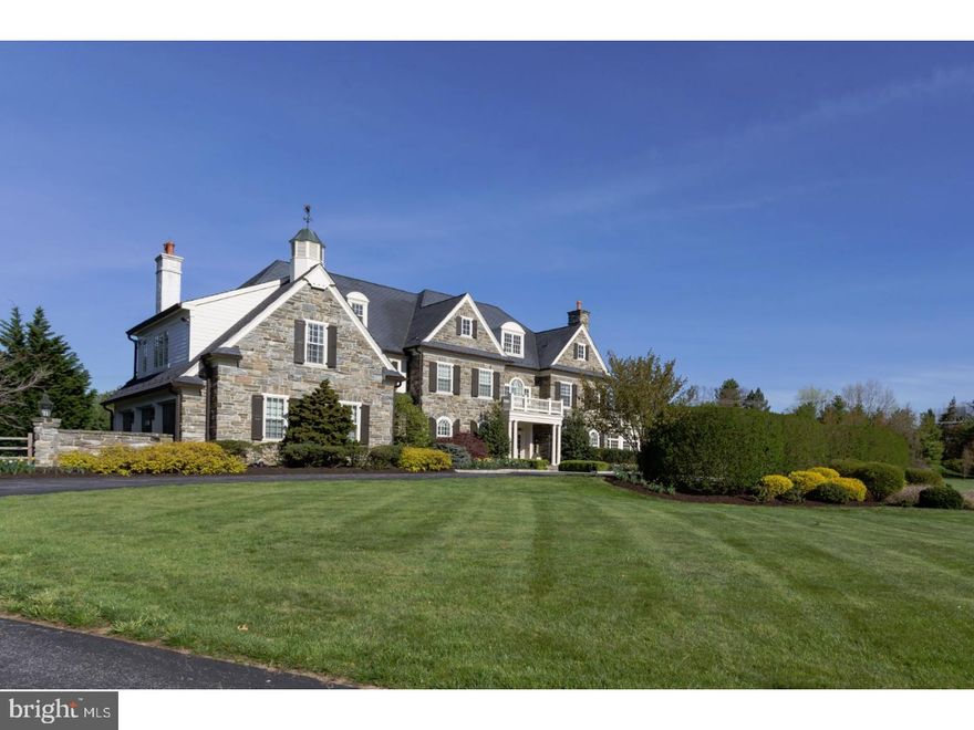 Stunning, custom stone manor home, with timeless integrity and attention to detail beyond compare.  The design of this beautiful and inviting home is rooted in the combined thinking of its owners, architect and designer and is the ideal family home that offers opportunity for grand entertaining but also comfortable family living. It is ideally situated on just under 2 exquisitely landscaped acres at the end of a quiet cul-de-sac just steps from the EA campus. Masterfully built of superior craftsmanship and quality, the 10' tall first floor showcases a welcoming front to back foyer that opens into a stunning Living Room with fireplace, spectacular Dining Room, handsome Den with built-ins and fireplace and Chef's Kitchen with commercial grade appliances, 2 Sub Zero refrigerators, 2 dishwashers, 2 sinks and enormous Island, Breakfast Room with a sourround of windows and French door that opens to the back patio, a Butler's Pantry with a mini fridge, sink and ice maker. The comfortable Family Room has a coffered ceiling and raised stone fireplace. There is an additional large Family Room tucked in the back hallway with built-ins.  The Mudroom has a command station desk,large closet,built-in cubbies,powder room and a door to the 3 car garage. There is a also a spacious sunroom and formal powder room to complete the first floor. The second floor offers a gorgeous Master Bedroom with vaulted ceiling,fireplace,dressing room with three walk-in closets, a spa like marble master bathroom with a steam shower, jacuzzi tub, double sinks and built-in vanity.  There are 4 additional large family bedrooms with ensuite baths, a large sitting with built-ins room and laundry room on the second floor.  The third floor has two bedrooms and a full bathroom.  The extraordinary lower level offers a bar with an ice maker, mini fridge, and dishwasher, a wine cellar, comfortable media room with projector/screen, gym, game room, playroom with built-in playhouses, art room with sink and chalk board, a full bathroom and plenty of room for storage.  The spacious slate patio has a stone wall surround, built in gas grill, and stone fireplace. The yard offers privacy, plenty of room to play, a garden and specimen plantings.