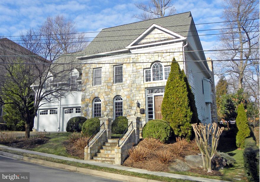 Located in Country Club Hills, this 5BR/5.5BA masterpiece of design & craftsmanship has it all! Gourmet Kitchen, Family Rm, B'fast Rm, Library & Elevator to All Levels. Expansive MBR w/lavish MBA, 3 W-I closets, Sitting Rm & FPL. Daylight LL w/Rec Rm, Media Rm, Wine Cellar & BR5/Den. Stone Veranda w/FPL. Random-width HDWD floors, custom woodwork&cabinetry, oversized moldings, coved ceilings & more