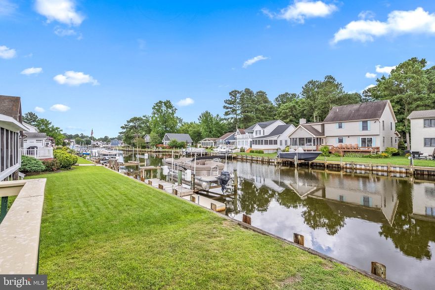 Ocean Pines Waterfront Home in Teal Bay Section. This waterfront property in the desirable Teal Bay section of Ocean Pines offers 1,942 square feet of living space with views down the canal. Recently updated with a new roof in 2024, this home features an open floor plan that maximizes natural light and waterfront views. Enjoy relaxing or entertaining on the huge rear screened porch overlooking the canal. The home also includes a 2-car garage for added convenience. Located close to the golf course, pools, marina, and boat ramps, this home is a boaters dream with 60 Feet of Bulkhead to dock you boat and Jet Ski. Do not miss out on the best buy for waterfront living in Ocean Pines and bring your boat and start enjoying the best of waterfront life today! This is the one you have been waiting for.....Summer is just around the corner.