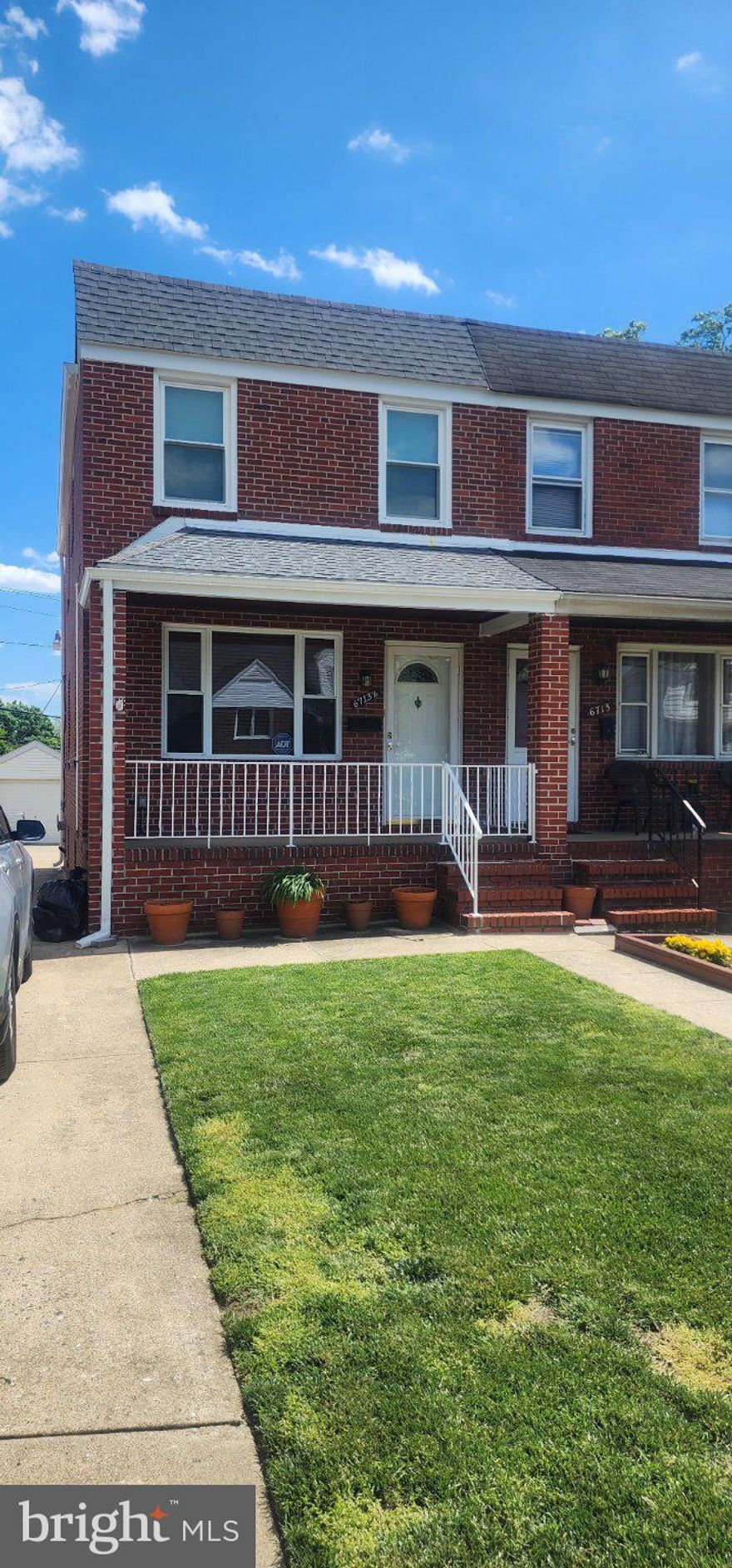 Beautiful 3 Bedroom 1 and 1/2 Bath Brick Semi-Detached Features Large Kitchen w/Wood Cabinets, All Appliances Convey, Lower Level Family room with 1/2 bath, Carpeting, Front Covered Porch, 1 car Garage, Off Street Parking, 4 Window Units, Must See!!