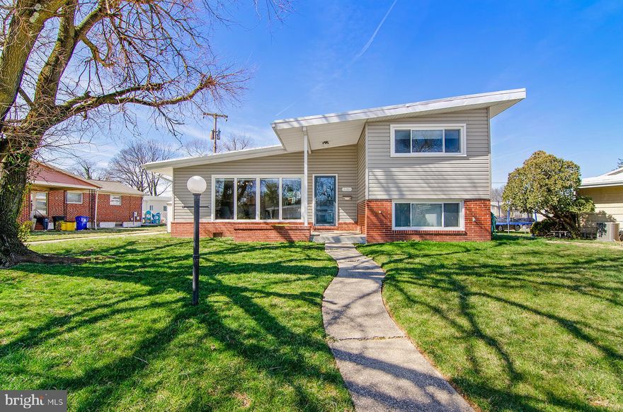 Move right into this expanded, updated, and well maintained 4 bedroom, 2.5 bathroom home on a sought-after block! The main level features a wonderful quaint dining room, cozy living room, a gorgeous, very large Kosher kitchen which opens up to a spacious airy den along with a powder room & laundry room! Side entrance from the driveway makes coming and going very convenient. Upper level includes 3 roomy bedrooms and 1 updated full bathroom. Lower level features a lower den/rec room, 1 more generously sized bedroom and another updated full bathroom. Outside you will find an inviting front entrance, long driveway and rear porch with a pergola for outdoor relaxation! Schedule your private tour today!