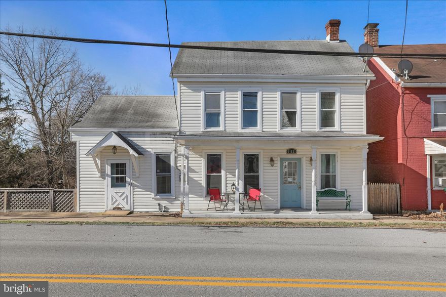 This 4-bedroom, 2-bath Colonial offers a well-designed layout with room to grow and adapt to your needs. The main level features a kitchen, inviting living room, a main-level bedroom, full bath, a large family room ideal for everyday living or entertaining, and a separate laundry room for added convenience. Upstairs includes three additional bedrooms and a full hall bath, with one bedroom offering an attached bonus room—perfect for a potential fifth bedroom, walk-in closet, nursery, home office, or hobby space. A huge unfinished attic provides excellent storage or future expansion potential. Enjoy outdoor living in the fully fenced backyard, complete with a deck, shed, and plenty of yard space for relaxing, pets, or play. Parking is a breeze with a 1-car garage accessed from the rear alley plus additional on-street parking in front of the home. This home is strictly sold AS-IS and offers a great opportunity for buyers seeking space, versatility, and the chance to make improvements over time. Schedule your showing today!