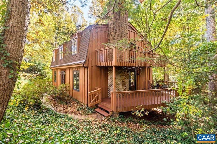 OPEN HOUSE SUN 2-4pm Don't miss the opportunity to live in this coveted Albemarle neighborhood so close to town. Located on the quiet end of a cul-de-sac around a green circle with lots of mature plantings, this property enjoys nice privacy. Large 1/3 acre lot joins with other large lots to form a valley of trees behind this home. From the back yard and from a deck off the den & an upper deck off the primary BR, look into a long view of dappled sunlight coming through the high canopy of large trees. There are lots of birds and a stream among the parklike woods here. Traditional colonial layout has 4 BRs all on the 2nd floor with large living spaces on the main floor. Large kitchen has original finishes all in good condition with a large breakfast room and ample pantry space. Two wood burning fireplaces, one in the den on the main level, one in the family room on the terrace level. Hardwood floors are in excellent condition. Lower level walks out to the back yard. Workshop/art studio on the lower level could be made into more bedrooms or office space with the addition of flooring. Only a 20 min walk to Barracks Road Shopping Center where you can find groceries, coffee shops, restaurants and services. Access to nice walking trails..,Formica Counter,Wood Cabinets