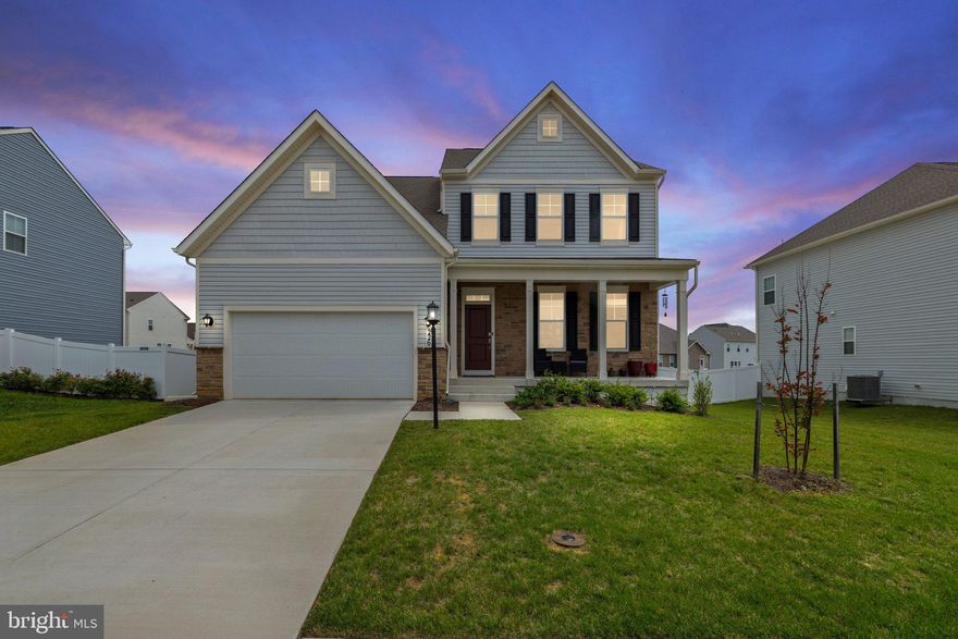 Welcome to 226 Triberg Dr – A rare opportunity to own the coveted Hartford model, one of the largest and most thoughtfully designed floorplans in Norborne Glebe, no longer offered by the builder.
This beautifully upgraded home offers over 4,100 finished square feet across three levels and sits on a premium lot with excellent curb appeal and a welcoming front porch. Inside, you’re greeted by luxury vinyl plank flooring that flows throughout the main level, complementing an open, sun-filled layout perfect for both everyday living and entertaining.
At the heart of the home is a chef’s kitchen featuring a large center island, walk-in pantry, and a dedicated butler’s pantry for additional prep and storage space. A separate office, half bath, and well-designed mudroom round out the main level.
Upstairs, the private bedroom level features four spacious bedrooms and a full laundry room. The hall bath includes dual sinks and a fully tiled tub/shower combo, while the oversized primary suite offers two vanities, a walk-in closet, and a spa-style tiled shower.
The fully finished basement adds incredible flexibility, offering a large rec room, full bath, and a 5th bedroom with a walk-in closet—ideal for guests, multigenerational living, or a home gym.
Outside, enjoy a fully fenced yard and custom paver patio perfect for entertaining or relaxing.
Located in the desirable Norborne Glebe community with sidewalks, playgrounds, and open green spaces, you’ll also enjoy easy access to commuter routes, shopping, dining, and historic downtown Charles Town.