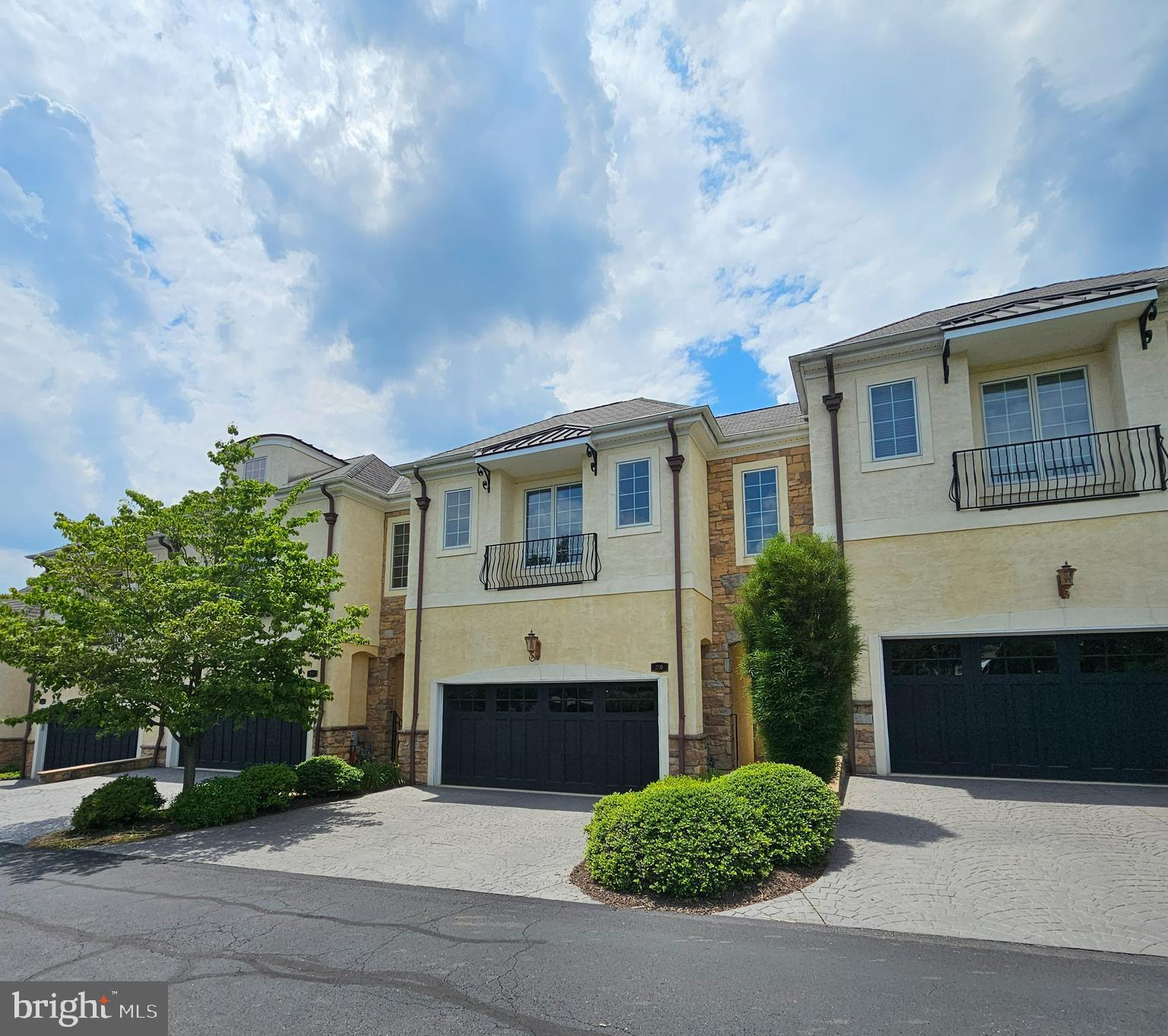 Stunning 3/4 bdrm Bordeaux model nestled in prestigious Breyer Ct with impressive French-inspired courtyard, exquisite wrought-iron entry gate, and luxurious center fountain with professionally landscaped gardens! Enter your personal gated atrium to the front door. Step into the grand 2-story foyer that opens to the expansive great room, complete with 10 ft ceilings, gleaming solid oak floors, impressive 7-inch baseboard molding , recessed lighting, and neutral paint. The gourmet kitchen boasts Giallo beveled-edge granite countertops, Kraftmaid 42 inch cabinets with crown molding trim, dovetail drawers, new GE Cafe Line Fridge, new Bosch Dishwasher, and 5 burner gas stove. The elegant dining room with bay window and bump out with gorgeous views of your lush tree-line and deck with natural gas line grill...no propane tanks needed! The 4th bedroom is being used as an office/study with plush carpeting, chair rail, and crown molding . The daylight basement with egress is ready to be finished with roughed-in plumbing for a full bathroom & wet bar. Whole house sprinkler system for your piece of mind! The massive primary suite plus sitting room features tray ceiling, crown molding, recessed lighting, plush wall-to-wall carpeting, and a luxurious primary bath with Chiaro tiled floors, dual raised sinks plus vanity, garden soaking tub with jets, separate shower with frameless shower door, and water closet. Conveniently located minutes from Old York Rd, Washington Lane, Township Line Rd, Church Rd, Abington Hospital, Curtis Arboretum, & Salus University. The HOA covers Common Area Maintenance, Exterior Building Maintenance, Insurance, Lawn Maintenance, Security Gate, Snow Removal, Trash Removal! Don't miss out on your dream home! Schedule your showing today!