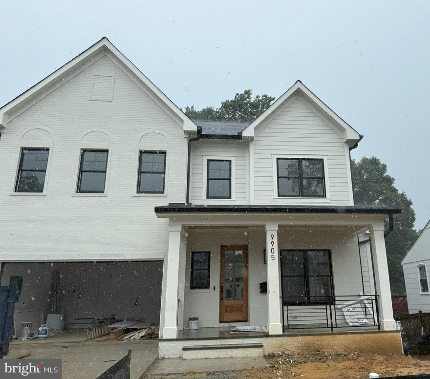 Stunning, brand new brick Colonial with inviting front porch built by esteemed builder, ERB Properties. This home offers an amazing open floor plan with 4 finished levels, 6 bedrooms and 5.5 bathrooms! Featuring beautiful craftsmanship and finishes, abundant recessed lighting, wide plank hardwood floors and plenty of windows to let in the sunshine, it is ready for you to move right in! On the main level you will find an inviting living room, a formal dining room, a gourmet chef’s kitchen with high end stainless steel appliances, soft close cabinets & drawers, quartz countertops, island, and a breakfast area. A light and bright gorgeous family room with a gas fireplace leads out to a lovely deck. There is also a mudroom with cubbies and benches off of the two car garage and a powder room. The spectacular upper level includes a relaxing primary suite, 2 custom walk-in closets, a luxurious spa bath with a separate frameless glass enclosed shower, soaking tub and two vanities. Also on the upper level are 3 additional bedrooms, 2 additional full bathrooms and a laundry room with a sink, cabinets, washer and dryer. On the 2nd upper level there is a bedroom, full bath and loft/office. On the fabulous walk-up lower level you will find a delightful recreation room, a bedroom, a full bathroom, an exercise room, and a separate entrance. Located in the desirable Georgetown Village subdivision, this home is part of the Walter Johnson High School cluster.