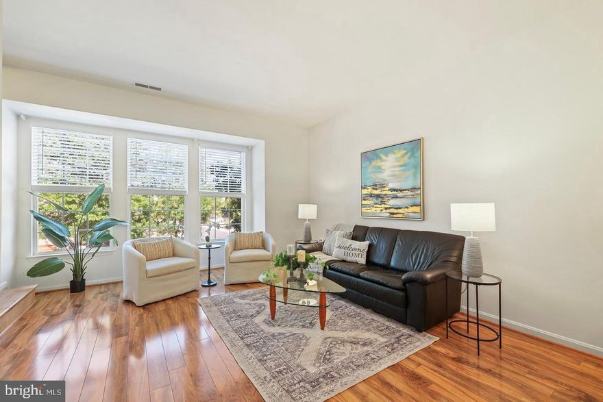 Lovely, sundrenched 3 Bedroom, 3 bathroom 3 level garage townhome in Parkside at Dulles features the right blend of space and updates to entice you to stop looking.  This is the one for you!  Agressively priced and available for a quick move in, don't miss this beauty.   The entry level features access to the garage and a versatile room easily used for an office/den/guest room.  The adjoining full bathroom makes this area perfect  for a housemate.   The laundry is located here on this floor also.  Up the stairs to the  welcoming open concept space enhanced with a large sun-filled living room with chic laminate wood flooring and a wall of windows facing a lovely, landscaped no through street. The tv nook and fireplace serve as the room's focal point.  The adjacent dining room opens to the breakfast bar and kitchen with plenty of space for a cafe table and coffee station.  From here the expansive sliding glass door leads to a delightful, low maintenance composite deck that backs to trees - a private outdoor escape relaxing or entertaining.  Upstairs, the primary BR has large windows providing an abundance of natural light and boasts generous closets.  A spacious ensuite BA has been remodeled with contemporary flair.   A second bedroom is generously sized and enjoys the full BA in the hallway.  New roof and insulation helps reduce utility bills.    This popular and friendly neighborhood offers a community clubhouse, pool, gym and playground plus a walking trail leading to a picnic table and chairs. There is a fence around the perimeter for extra privacy, deterring walkers from taking short cuts.  Plentiful parking with your own garage and  driveway as well as many  visitors spaces marked with a V - plus one parking tag conveys for overnight visitors.  Convenient for commuters using Rte. 28, Rte. 7 and the Dulles Toll Road or hop on the metro from close by Innovation Center Station.  Very near Dulles Airport.  Some furnishings can be left for tenants.  SORRY NO PETS OR SMOKERS.  Fill out your application today!