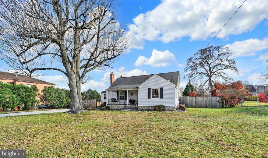 Rare Orchard Hills Gem with Oversized Lot and Unbeatable Location!
Enjoy the perfect balance of space and convenience in this adorable Cape Cod, just seconds from 695, 83, and York Road — yet peacefully situated on a premium lot that does not back to 695. In the Ridgley and Lutherville Lab School District.  One of only four homes in Orchard Hills with a lot this size, it offers exceptional outdoor living with a new privacy fence (Spring 2025), freshly painted deck (Nov 2025), raised garden beds, and a fire pit area. Inside, natural light fills the home through updated  and brand-new windows (Nov 2025), complementing refinished hardwood floors and a cozy wood-burning fireplace with Regency Insert. The bright kitchen is the heart of the home with  painted cabinets, quartz countertops, stainless-steel appliances, and new LVP flooring (2020). A small pass through joins the addition currently used as a dining room with French doors opening to the enclosed porch and   the backyard—perfect for entertaining. The main level includes a primary suite addition with updated five-piece bath, his and her closets; and  a second bedroom and updated bath, main-level laundry, and a flex room for dining, work, or play. Upstairs offers another bedroom and a cheerful playroom, office or another bedroom.  Energy-efficient upgrades include attic insulation and  crawlspace encapsulation and insulation (BGE Gold Energy Star Certified, 2021), plus a 50-year roof (2016) still under warranty. A truly special home in a prime, private location!