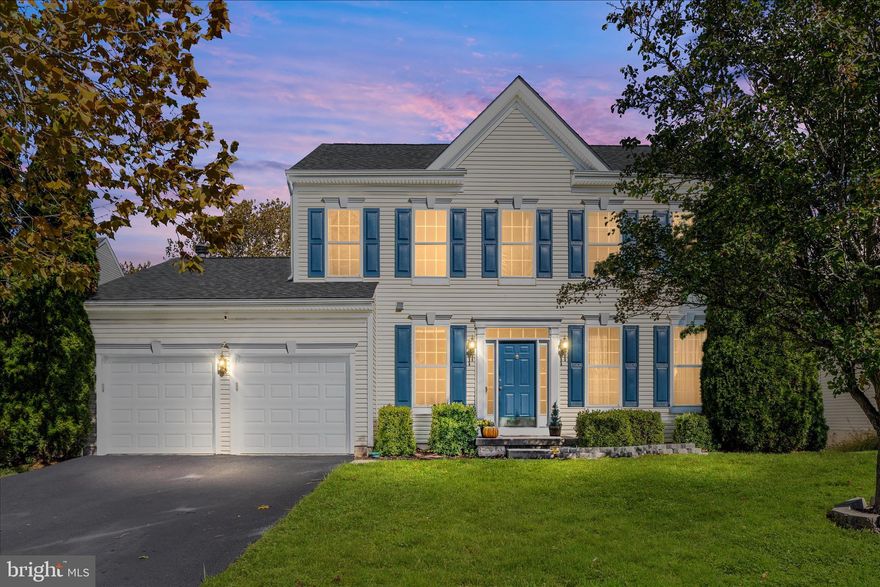 Welcome to this beautifully maintained 4-bedroom, 3.5-bath single-family home situated on a level 0.25-acre lot. Enjoy outdoor living on the Trex deck overlooking the level fenced backyard, perfect for entertaining or relaxing. The home features a full walk-out basement, offering additional living space and flexibility that includes a full bath, rec room, bonus room, and storage. From the freshly painted front door and shutters to the primary suite with double walk-in closets this home epitomizes both value and quality living space. The inviting spacious foyer with HDWD floors that continue to the living and dining rooms that are well-sized and light-filled. The kitchen, breakfast room and family room offer an open flow with luxury vinyl plank flooring for ease of care. A gas fireplace with stone surround is a focal point amidst the over-sized windows and sliding glass door to the deck. As the kitchen is the center of any home, this kitchen is indeed the central location with desk space to manage one's schedule and communications. A powder room and laundry complete this level. Up the newly carpeted stairs and hallway to the left is the primary suite with vaulted ceiling, double walk-in closets and a spacious primary bath. A separate soaking tub, walk-in shower, double sink vanity and linen closet set the stage for morning routines or relaxing evening rituals. Three secondary bedrooms along with a hall bath finish this level. A neutral paint palette has been updated throughout the main two levels along with neutral carpeting on the bedroom level. Major improvements and maintenance items include in 2018  roof replacement, upgraded appliances, 2023 new driveway, 2021 Trex deck added & exterior trim repair, 2016 water heater 2015 garage doors replaced & backyard fencing 2019 LVP in kitchen, family room & breakfast room. 2025:  exterior paint, new commode & floor in LL full bath, new carpet on stairs and UL hall & several rooms repainted in neutral tones. Flooring in bedrooms replaced in 2015.