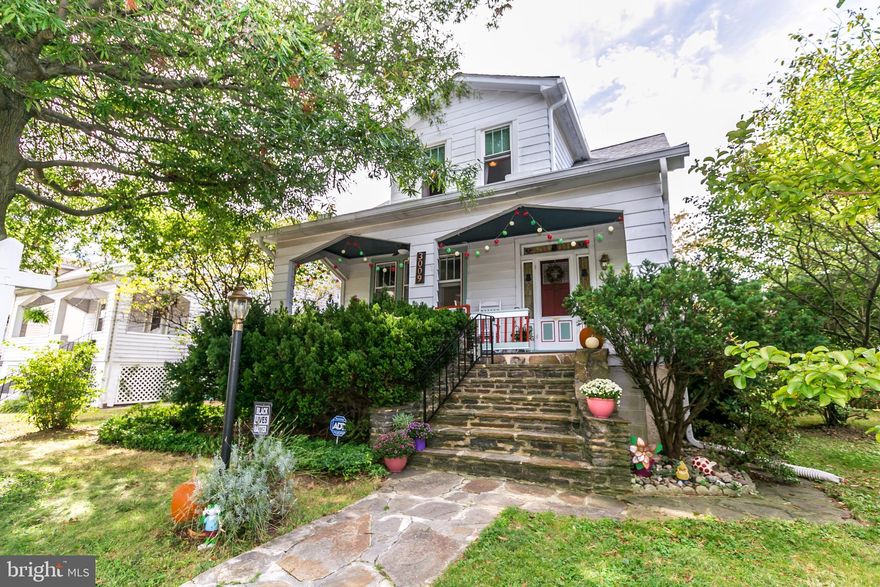 Ooooooo the charm oozes from this porch-front Hamilton bungalow! Features include; original hardwood floors, 9 ft+ ceilings, spacious living room & separate dining room, enclosed sunporch off of the kitchen, 1st floor half bathroom, hardwoods throughout upstairs, large closets in the bedrooms, upstairs full bath has the MOST BEAUTIFUL ORIGINAL tilework, partially finished lower recreation room space, large backyard with playset (if buyer wants it to convey) & shed and the landscaping and mature trees make you forget you are in the city!  Sellers have taken great care with this home. Updates include; 21 replacement windows, NEW roof with warranty, waterproofing system in basement, new sump-pump, termite service contract has been maintained and 1 year First American Home Warranty is offered with this home.   Don't think about it too long, this home is SOOOOOO charming, it is bound to snag a new owner quickly!