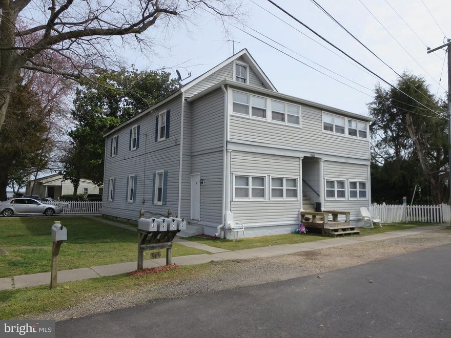 Updated and well-maintained! High ceilings add a spacious touch to every room. The bedrooms are generously sized, while the cozy kitchen and inviting living area provide ample comfort. Enjoy the sun-filled relaxation of the sun room. This home boasts an unbeatable location, allowing you to easily walk to all that Colonial Beach offers – from the beach and restaurants to a variety of entertainment options. Plus, you'll even have a view of the water. Additional $150/month utility fee pays for washer/dryer access, water, hot water, sewer, trash, and lawn care.