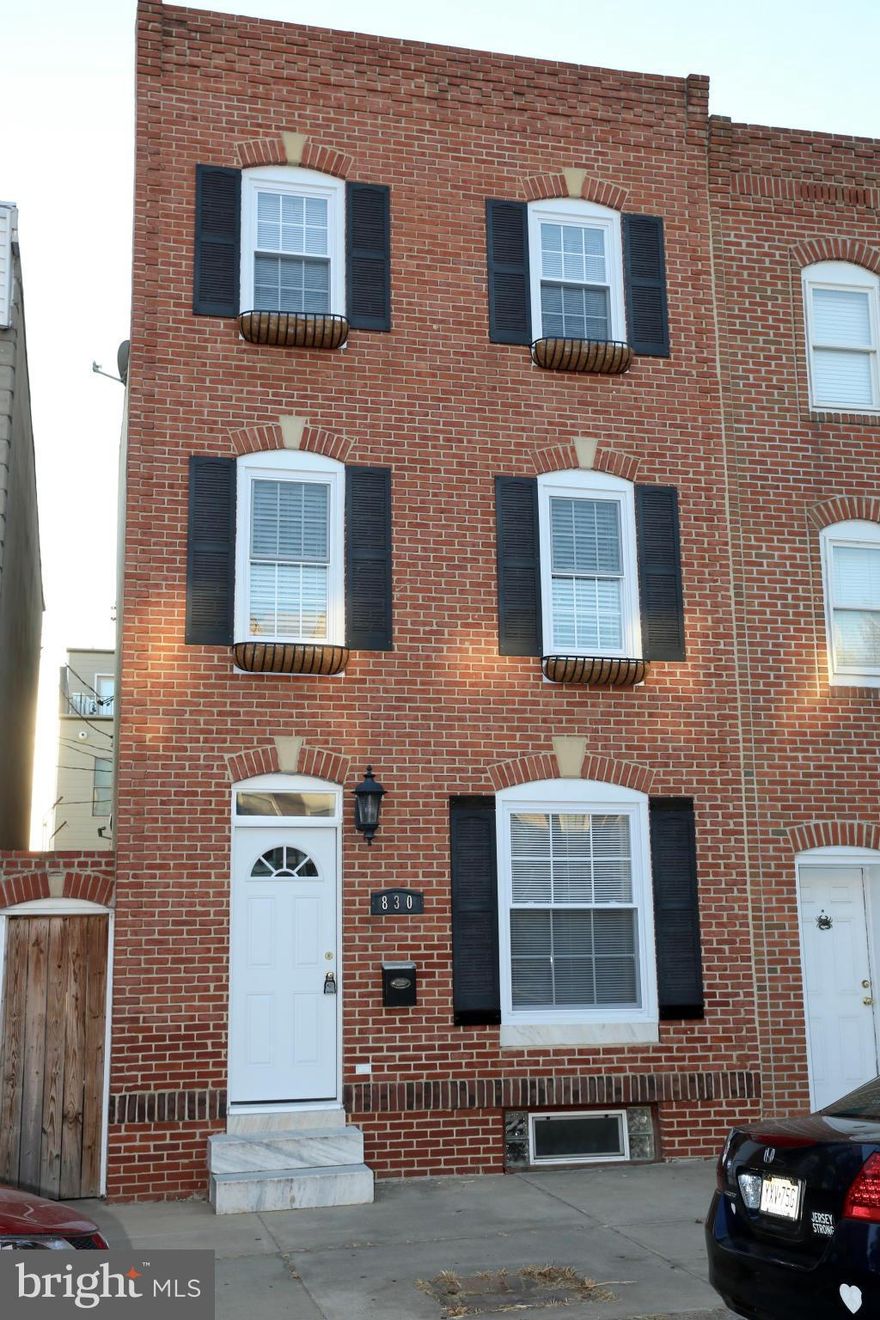 Reduced. Rare find in Canton. This house is 15 ft wide and 70 ft deep 4 finished levels. Two teared roof top deck 13x10 and the lower one 10x10 with a beautiful view of the Baltimore City skyline. Gated walkway and rear yard. 4 Bed rooms 3 1/2 baths Hardwood floors The kitchen offers granite countertops with an island. Freshly painted. Easy to show.