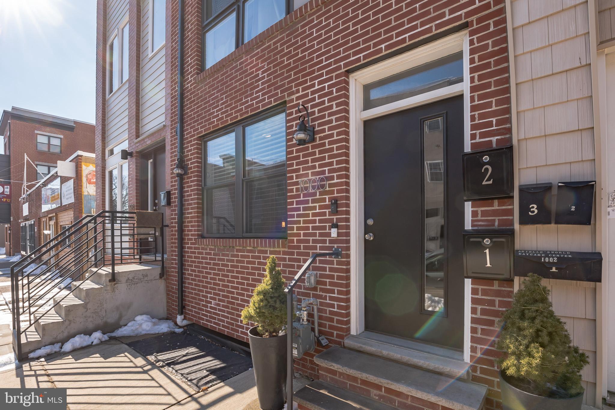 Northern Liberties 3 level condominium, 3 bedrooms and 2 1/2 baths. Near the Piazza and very close to public transportation. This condo comes with a tax abatement- 7 year remaining . The main level has a Great Room from the front wall of the building to the rear wall and the rear wall features floor to ceiling windows and a glass door with a transom encouraging a great indoor/outdoor relationship with a big back yard. There are 9 foot ceilings, Shaker Style cabinetry, Oak hardwood flooring, and an overload of windows. The front of this home features a dining room and two large windows. The kitchen drapes you in 42" tall cabinets, some with glass front doors and a 4 piece stainless GE Profile appliance package. The upper level has a master bedroom suite with its' own bathroom. The lower level features two bedrooms each with it's own outdoor space and plenty of light, full bathroom, laundry closet, and a high-efficiency gas furnace.