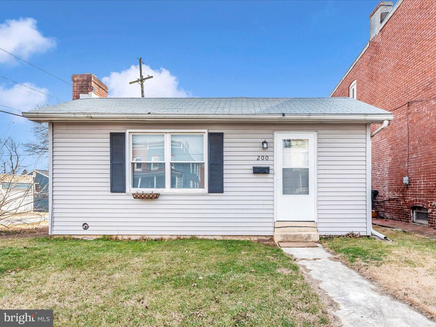 Single Family in downtown Frederick sitting on a sizable corner lot with ample private parking. Freshly painted, new roof installed in 2023, new electric baseboard heat. Great starter or investment!