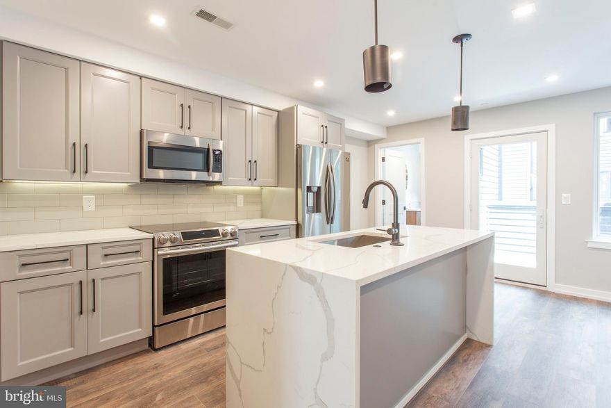 Welcome to 1619 Bainbridge! This stunning new construction building in Graduate Hospital offers luxurious space at a great value. Enter your brand-new home and immediately notice the great natural light from the large windows. Step across the beautiful flooring to your modern kitchen, featuring all brand new stainless appliances, quartz counter tops with bar seating, and ample cabinet space. NEST Thermostats, hard-wired speakers in the ceiling and outdoor spaces, and Video Intercom to the front entrance are just some of the many features of this condo. Unit 2 features one bedroom with hardwood flooring, large closets and recessed lighting, and a full bathroom which offers fantastic tile, a tub, shower and vanity. Unit 2 also has a private balcony. Prime Location! This property provides easy access to restaurants, shopping, schools, public transportation and much more. Easily walk to the Center City, the Broad Street Subway, Rittenhouse Square, and the Schuykyll River Trail. Great access to Penn, Drexel, and CHOP. Close to I-76 and I-95 for an easy commute out of the city. Located in the Greenfield Catchment. Don't miss a great opportunity to live in this one of a kind building. Photos are of a similar unit same builder recently built.