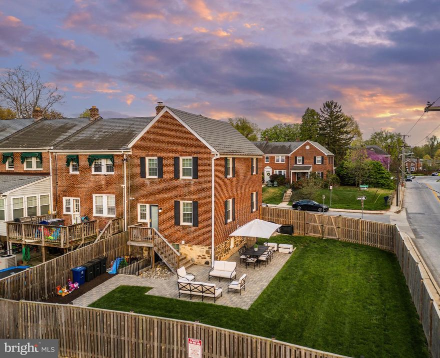 A true Rodgers Forge masterpiece. The classic end-of-street townhouse that you know and love, taken down to the studs and fully renovated to perfection. No inch left untouched, with attention to detail everywhere you turn, from the era appropriate trim to the 12’ built-in buffet to the notable door hardware. Step inside and instantly feel at home as the natural light pours in from three sides. Stunning kitchen renovation with quartz counters completed in 2019. Upstairs you’ll find the timeless Rodges Forge floorplan elevated to a whole new level, granting a double-sink vanity and full double closets. Head down to the lower level and prepare to be shocked by the generous amount of space. A large recreation area, bedroom with full bath, laundry, storage, and not to mention the well-thought-out under stair bar with wine fridge. Step onto new deck and take in the view of the new interlock paver patio and expansive sunny yard, fully enclosed with privacy fence. Just beyond the back fence awaits two private parking spaces to add extra convenience. Homes renovated with this level of thoughtfulness are rare gems that don’t last long. Here is your opportunity to have it all in your dream neighborhood. The art of uniting human and home.