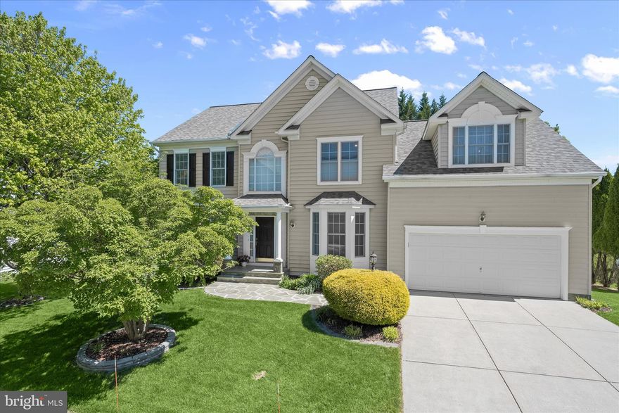 More than a home, this is a thoughtfully updated, worry-free lifestyle in the sought-after Emerson community. Meticulously maintained and enhanced with meaningful upgrades, this residence offers both beautiful living spaces and true peace of mind for its next owner.
Exceptional curb appeal welcomes you with a covered stone front porch and walkway, setting the tone for what awaits inside. A two-story foyer introduces gleaming solid oak hardwood floors, installed in 2025, and a fresh, neutral palette that continues throughout the main and upper levels. Formal living and dining rooms with crown molding provide classic gathering spaces, while the heart of the home unfolds into a bright, open kitchen featuring quartz countertops, a center island, stainless steel appliances, a walk-in pantry, and recently updated fixtures including a new refrigerator in 2025, double wall ovens, dishwasher, and microwave installed in April 2026, along with a new faucet and garbage disposal. The adjacent breakfast room offers direct access to the deck, while the family room impresses with a vaulted ceiling and cozy fireplace, perfect for everyday living and entertaining. A main-level office with access to a full bath adds flexibility for remote work or guest accommodations.
Upstairs, four generously sized bedrooms include a spacious primary suite with a cathedral ceiling, walk-in closet, and an en-suite bath featuring a double vanity, soaking tub, and separate shower. The additional bedrooms share a well-appointed full bath with a double sink vanity, offering both comfort and convenience.
The finished lower level expands the home’s versatility with a large recreation room, two bonus rooms ideal for exercise, hobbies, or guests, and an updated full bath. Walkout stairs lead to a tree-lined backyard complete with a deck and stone patio, while a community path just behind the home enhances the outdoor experience.
Significant system updates include a new roof in 2022, a new water heater in 2022, and a two-zone HVAC system with the main level unit fully replaced in 2024. A built-in speaker system adds to the home’s modern functionality, and the absence of a front foot fee provides added long-term value.
Located in a vibrant, amenity-rich setting, Emerson offers miles of scenic trails, playgrounds, tennis courts, rentable event spaces, and a welcoming neighborhood atmosphere with community events throughout the year. The clubhouse complex features a resort-style pool, fitness center, and gathering spaces, all contributing to a lifestyle centered on connection and convenience. Ideally positioned in Howard County with easy access to Baltimore, Washington, D.C., and Annapolis, this home delivers the perfect balance of tranquility and accessibility.