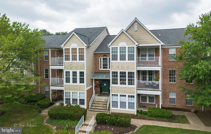 Gorgeous Greenspring East 2 Bed/2 Bath CONDO. This lovely refreshed condo offers comfort, convenience, and contemporary design with an open floor plan. The newly refreshed kitchen features painted cabinetry & hardware, recently installed new flooring and new gorgeous granite countertops. The kitchen has a view to the living room and porch with a breakfast bar with seating for 8. The primary suite offers a tranquil retreat for rest and relaxation, complete with a walk-in closet and an en-suite bathroom featuring  a tile surround shower.  The second bedroom is adjacent to the second bathroom well appointed with a tub/shower with tile surround. Designed with a focus on comfort and convenience, this condo also includes a designated laundry area with storage, ensuring that daily chores are a breeze. The private balcony provides a serene outdoor space, perfect for savoring your morning coffee or enjoying a quiet evening. Residents of Greenspring East enjoy a range of exceptional amenities. The community offers meticulously maintained grounds that invite leisurely strolls.... Additionally, this condo includes easy parking and is conveniently located near the Shops and Restaurants at Quarry Lake and I 695 with access to downtown Baltimore. Schedule a showing today! Your new home awaits!