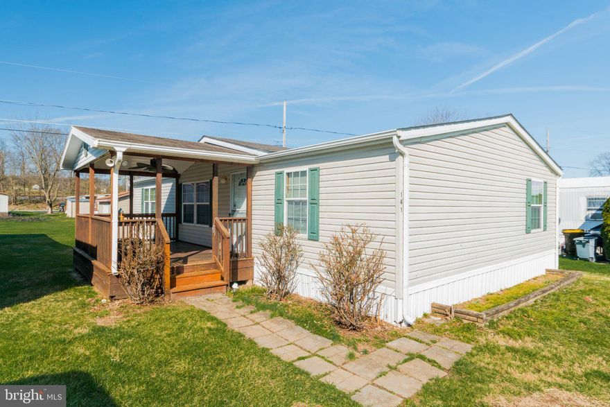 Welcome home to this beautifully maintained 2007 double-wide manufactured home offering 1,279 sq ft of comfortable living space. This inviting 3-bedroom, 2-bathroom home features a bright and functional layout designed for both everyday living and entertaining. The spacious family room flows seamlessly into the dining area, creating an open and welcoming atmosphere. The kitchen offers plenty of storage, including a convenient pantry, while the nearby laundry room comes complete with a washer and dryer for added convenience. Each bedroom features its own walk-in closet, providing excellent storage throughout the home. The primary suite serves as a relaxing retreat with a soaker tub in the private bathroom—perfect for unwinding at the end of the day. Step outside and enjoy the covered 10x16 deck, ideal for morning coffee or evening gatherings. The property also includes a paved driveway and a 10x12 storage shed, offering extra space for tools, hobbies, or outdoor equipment. Major updates add peace of mind, including a new roof (2019/2020) and a water heater replaced in 2023/2024. This well-cared-for home offers comfort, practical storage, and great outdoor features—ready for its next owner to move in and enjoy!   **Original homesite on a rented lot. Prospective buyers must apply to Roselandcommunities.com to be approved to the park. Application fee is $25 for each adult that is going to be on title. Lot rent is $450/mo with a security deposit of $225. Lot rent includes snow plowing of the roads, maintenance for the common (grass) area, playground, basketball court and pavilion with picnic tables**