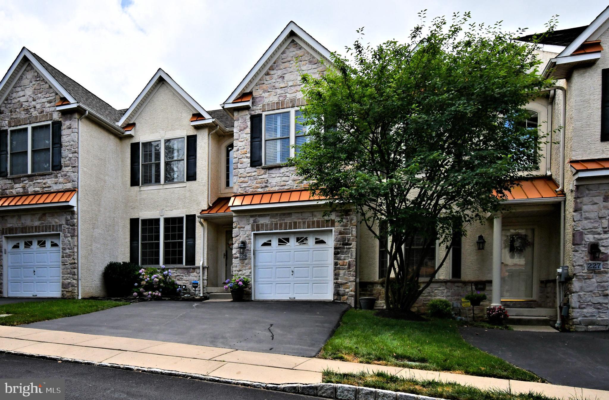 Tucked away on the border of Conshohocken and Plymouth Township, 229 Barefield Lane is the perfect blend of modern elegance and everyday comfort. This beautifully maintained townhome is nestled in a peaceful community yet minutes from the vibrant energy of Fayette Street, the Schuylkill River Trail, and major commuting routes.
As you step inside, you're welcomed by warm hardwood floors, abundant natural light, and an open concept layout designed for both entertaining and easy living. The spacious living room flows effortlessly into the dining room and into the kitchen featuring granite countertops, stainless steel appliances, a center granite island, and ample cabinetry, ideal for weeknight dinners or weekend gatherings. A cozy family room anchored by its gas fireplace adds warmth and charm
Upstairs, the serene primary suite is a true retreat with walk-in closet and luxurious en-suite bathroom, whirlpool tub, complete with double vanity and walk-in shower. A barn door separates a private home office within the primary suite offering a private workspace. Two additional bedrooms, a stylish full bathroom and upper floor laundry complete this level, offering flexibility for guests, a home office or a nursery. The lower level adds extra versatility with a finished space perfect for media area, workout room and ample storage space.
Outside , enjoy quiet evenings on your private deck - the ideal spot for morning coffee or a glass of wine as the sun sets. Located in a desirable neighborhood known for its walkability and community feel, this home offers the best of suburban living with the convenience of nearby shops, restaurants and public transmit. Notable upgrades include: New A/C Unit (May 2023); 50 gallon water heater with expansion tank (May 2021); radon mitigation system; added insulation to garage. Finished basement adds
approximately 1,000 square feet of living space . Totally almost 3,000 sf.; Updated hardwood flooring in basement; renovated powder room; updated faucets in bathrooms; updated door hardware, knobs and hinges throughout; updated lighting fixtures; entire home painted with neutral colors; barn door added to the home office in Primary Bedroom. Kitchen improvements include tile backsplash, recessed lighting, stainless appliances. Plantation shutters upstairs and cordless blinds downstairs . Trex composite deck. Parking in driveway for 2 cars. Over 20 outdoor parking spaces across the street for convenience for guests and family. Don't miss your chance to own this move-in ready gem in one of Conshohocken’s sought after locations!