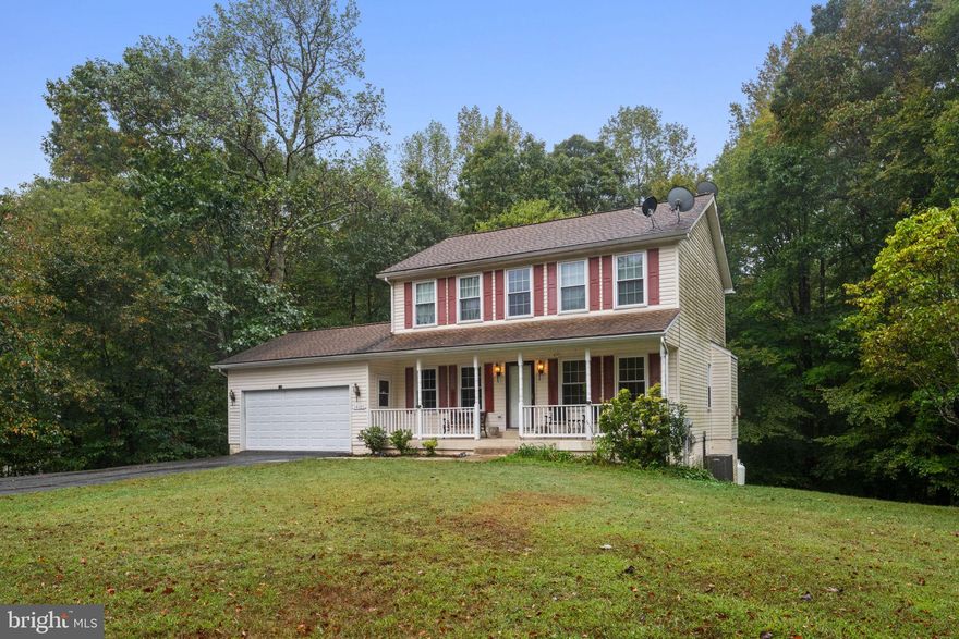 This classic Colonial sits on a full acre of flat, usable land with a spacious two-car garage and a finished walk-out basement complete with a full bath and space for a bedroom by adding doors. The main level features a formal dining room, living room, and an open kitchen that flows into the family room. Upstairs, you’ll find three bedrooms and two full baths, including a private primary suite with its own full bathroom. The large, level yard provides endless possibilities for outdoor use. Home needs some TLC, offering a great opportunity to add your personal touch and value. Conveniently located in Brandywine, just 10–15 minutes to Andrews Air Force Base, about 30 minutes to the Pentagon or downtown Washington, D.C., and 35 minutes to Annapolis.