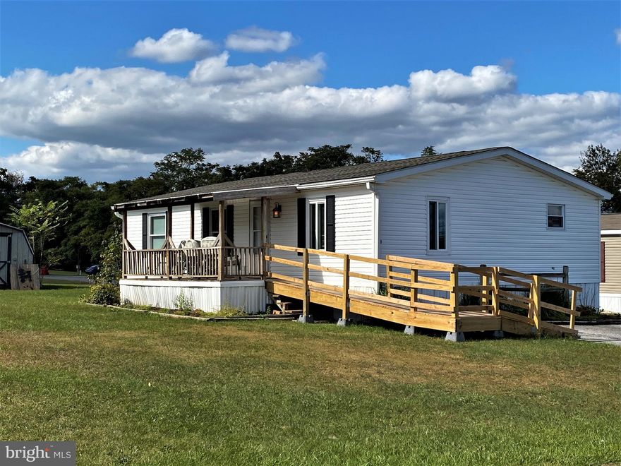 Tuscarora Schools! 2001 Doublewide home! Economical one Level Living! Custom Kitchen & Bath Cabinets, Ceramic Counter Tops, Upgraded Laminate flooring, Replacement windows, New Access Ramp, New Roof, 2 Side Decks, 1 Covered Side Deck, 10 Minutes to Chambersburg