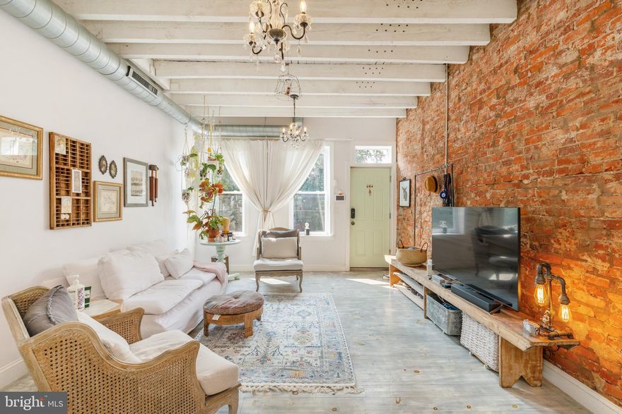 Step inside this one-of-a-kind abode, located in the vibrant Kensington - where artsy charm meets urban flair! This large 2 bedrooms 1.5 bathroom was renovated from top to bottom with custom features throughout.  From the hand finished hardwood floors, imported kitchen and bathroom tiles, and handmade light fixtures. You'll be swept away by its unique design that harmoniously blends local art pieces with European finishes. The large outdoor space lures you to unleash your imagination and create your own private oasis amidst the urban hustle. Picture yourself sipping coffee in the morning sun, or hosting lively gatherings with friends and family. Then, prepare to fall in love with the beauty of the kitchen! A gorgeous pastel blue-green palette wraps the space, infusing your culinary adventures with a whimsical sense of joy. The stunning custom curated brick wall extends from the first to second floor. The experience continues with exposed ceilings, revealing the inner workings of the home that allows for ease of maintenance! The front entrance is located two stories above the street, which add seclusion and safety to the home. Close by, you'll find yourself in the vibrant neighborhoods of Fishtown and Old City. These bustling areas are filled with eclectic shops, cozy cafes, delectable restaurants, and a lively entertainment scene. Your weekends will be a never-ending adventure of discovery and delight. So, if you're a free spirit, an art lover, and a city enthusiast, this uniquely crafted townhome in Kensington is the perfect canvas for you to paint your new chapter of life.