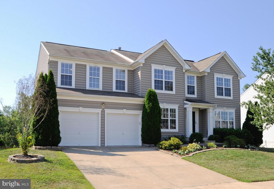 Gorgeous Move-In Ready Home! This home truly has it all!From its' open floor plan to large oversized rooms to a bonus open area on the bedroom level to a private fenced in backyard that backs to trees to a screened in porch...you will not be disappointed. Large bedrooms feature walk in-closets/Beautiful molding throughout/Master bedroom suite features custom wainscoting...you have to see it all!