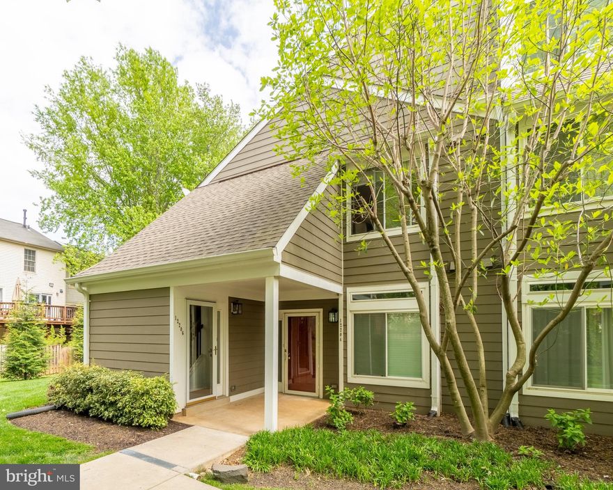 Luxurious Loft-Style Condo with Modern Amenities!

Nestled among the serene trees in a tranquil and quiet neighborhood, this stunning loft-style condo offers a perfect blend of modern luxury and urban convenience. Boasting brand new luxury vinyl plank flooring and stylish updates throughout, this residence is a showcase of contemporary elegance.

Step inside to discover an inviting open-concept layout bathed in natural light, accentuated by soaring ceilings and hardwood floors.
The updated kitchen is a chef's dream, featuring sleek quartz countertops, new cabinets, and stainless steel appliances, making meal preparation a delight.
This spacious condo offers 2 bedrooms and 2 bathrooms, both tastefully updated to reflect a modern aesthetic.
Indulge in the ultimate relaxation experience in the master bathroom, complete with a luxurious rainfall shower.  Hallway full bath features beautiful tile and tub.
Upstairs, a large loft area with hardwood floors provides versatile space for a home office, entertainment area, or additional living space.

Enjoy the serene surroundings from the comfort of your large covered balcony, ideal for al fresco dining or simply soaking in the natural beauty.
On cooler evenings, gather around the wood fireplace in the cozy living area, creating a warm and inviting atmosphere.

Residents of this community have access to a refreshing pool, providing the perfect retreat on hot summer days.
Situated close to major roads, commuting to work or exploring the surrounding area is a breeze.
Take advantage of the convenience of nearby grocery stores, shops, and dining options, all within walking distance.
For even more shopping and entertainment choices, Fairfax Corner, Whole Foods, Costco, and Fair Oaks Mall are just a short drive away.
Don't miss out on the opportunity to make this stunning condo your new home! Schedule a showing today and experience comfort living at it's finest!