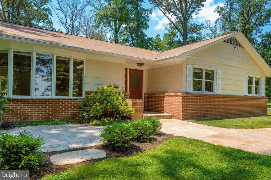 This custom rancher has a 8 mile view out of the level front yard. Hang that tree swing or just enjoy countless hours of shade under  majestic 200 year old trees scattered about the yard.  The homeowners built this property with all things nature in mind.  A small brick patio out front, a large screened porch outback that connects to a 31x23  composite deck.   The circle driveway is lined with stone with an oversized slate walkway leading to the front door.  The living room and dining room both have large bay windows that showcase the natural beauty and tranquility of this property.  Gorgeous hardwood floors throughout the main floor lead to 4 bedrooms and two updated full bathrooms. The owners suite is complete with a marble bathroom floor and newly tiled shower.  It's hard to believe but there is more!!!! The basement is set up for an apartment if you choose.  A kitchen, family room  with fireplace, bathroom, two bedrooms and a storage room. It doesnt matter whether you are inside or outside      There is so much to see here!!! 
Schedule your tour now!!!!!!

 There is also separate deeded parcel with tax account ID see documents. The lot is deemed not buildable because of the size. The lot would require a waiver or reconfiguring to become buildable.  The house is valued $699,000 with the lot priced under tax assessed value of $200,000 with the consideration of money to be spent to obtain building permit. You are buying both properties 4365 & 4357. Seller does not wish to seperate, or complete process to obtain building permit. Property being SOLD as is.  This is a great opportunity for some one to earn  equity or just enjoy the large expansive lot.  Walking distance to the private  Glenelg Country School .