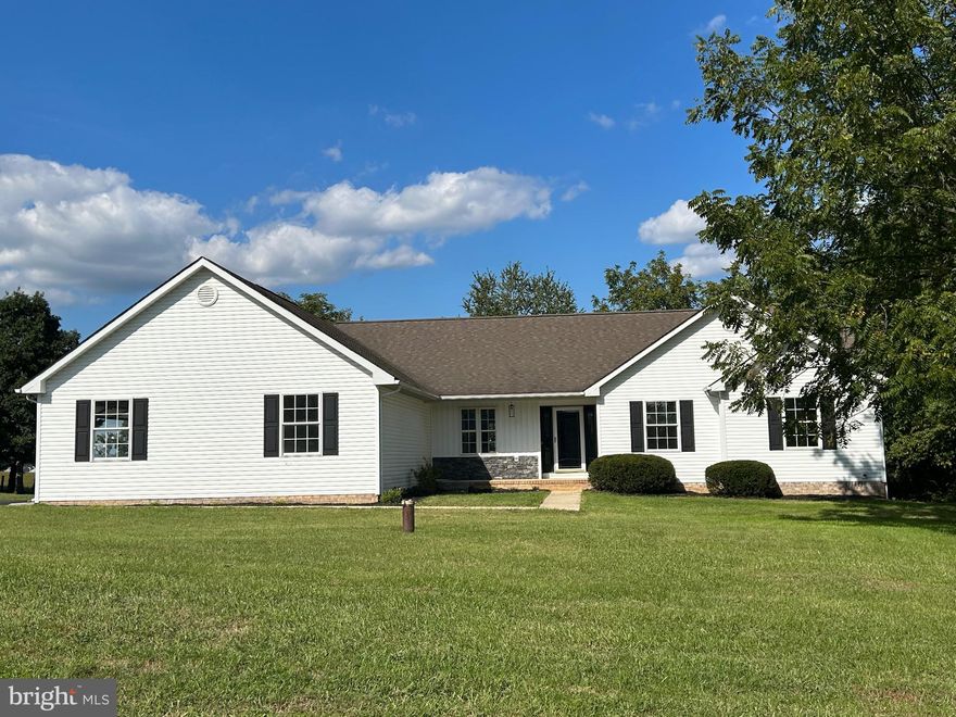 Well sought after Spring Mills Farm  Area,    This home has a beautiful lot with views of the pasture and mountains 2.03 acres.  Granite counter top, Stainless appliances. Large entertaining kitchen with an abundance of cabinet space. Cute coffee bar area. luxury  vinyl plank flooring.  This home comes with a one year warranty. Realtor is related to Seller