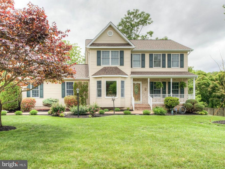 Beautiful 4BR/3.5BA home on a large corner lot in cul-de-sac. Features an eat in kitchen open to family room, large walk in closet & jetted tub in Master. Lounge in the Sun Room, on the Deck or take a dip in the Pool. Enjoy the shade on the lower level Pebble Stone Patio. Fenced yard is great for kids & pets. New Roof, Skylights, Gutter Guards, Appliances, Decking, Flooring & much More, Near VRE.