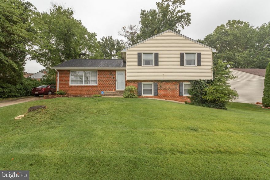 Back on market!  Buyers financing fell through.  Face mask must be worn for all showings.  Only 1 agent and 2 adults allowed at one time.  Welcome Home and look no further!!  This gorgeous house offers 4 great sized bedrooms, 2 full baths and 1 half bath.  The home is conveniently located close to major highways, dining, shopping, gym, Six Flags and Watkins Park.  Enjoy this 4 level home that has enough room for the family that likes to entertain.  The fourth level has a built in bar,  huge area for your pool table and room for family and friends.   Backyard has plenty of room for outdoor enjoyment and the front lawn looks like carpet.  There are too many great things to mention, so please feel free to make an appointment and see for yourself!!! While the home is beautiful, it is being sold as is but  home inspection is welcome for your buyers information.