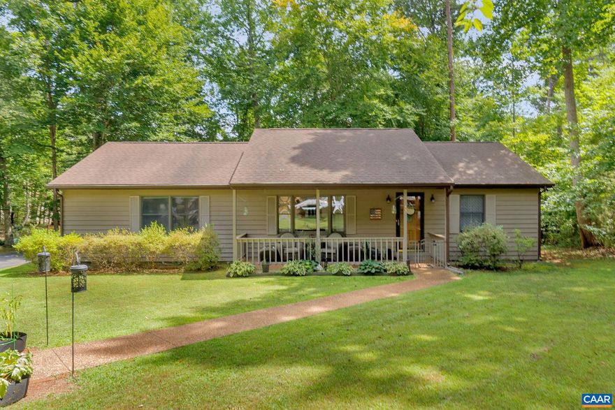 *****BACK ON THE MARKET DUE TO NO FAULT OF SELLER*******One level living in this beautiful home outside of the main gate now available.The open floor concept, cathedral ceilings, and fresh paint make this home feel so bright and roomy.  luxury vinyl plank flooring in the great room, foyer and master bedroom and new matching grey carpet in the spilt bedroom area make almost all of the flooring new except in the bathroom and kitchen. The long galley style kitchen has plenty of cabinet space as well as a good size pantry and is attached to the mudroom/laundry and side entrance for easily carrying in groceries. LG Convection Oven as well as NEW fridge. The covered back deck area provides a great space for entertaining outdoors. The sides to the awning are available and can make this a more private space. Some great features are: 9ft ceilings, encapsulated crawl space, blown insulation in the attic with lots of storage, new hot water heater, 12x18 shed/workshop, new refrigerator,new washer,new keyless entry on front door and large paved driveway.The roof was in good shape when they purchased in 2020 as well as the HVAC unit which is older but works very well.,Formica Counter,Wood Cabinets