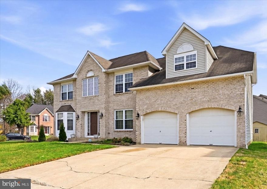 Welcome to 125 Hannum Drive, nestled on a large corner lot in the desirable Oakwood subdivision. This stunning Colonial-style home offers 3,200 sq. ft. of elegant, thoughtfully designed living space, perfect for modern family life. Step into the two-story foyer and immediately feel the open, welcoming flow of the home. The formal living room features French doors and provides a refined yet cozy space for reading or hosting guests. An additional set of French doors lead directly into the office/den, perfect for dual work-from-home setups, homeschooling, or a private retreat without sacrificing accessibility.  Across the foyer, the casual dining room offers a warm, inviting area for everyday meals or hosting holiday meals. The gourmet kitchen is a chef’s dream, featuring white shaker-style cabinetry, granite countertops, a large island, and stainless steel appliances including a built-in microwave, gas range, and dishwasher. An adjacent eating area with sliders opens directly to a large deck overlooking the expansive rear corner lot—ideal for outdoor entertaining, morning coffee, or summer barbecues. A butler’s pantry provides extra storage and a perfect coffee or tea station, while the first-floor laundry adds everyday convenience. The centerpiece of the home is the dramatic two-story family room, featuring a wood-burning fireplace, a wall of windows, and dual skylights, creating a bright yet inviting atmosphere for gatherings and everyday living. Upstairs, the owner’s suite is a true retreat with a sitting area, large walk-in closet, and a spa-like en-suite bathroom complete with a soaking tub, separate tiled shower, and dual vanity. All secondary bedrooms are generously sized and fully carpeted. An updated hall bathroom features an updated vanity and shower/tub combo. The second-floor bridge overlooking the family room adds architectural elegance, and the updated hall bathroom offers a modern, refreshed space for family and guests. The partially finished basement includes a finished recreation area along with a large unfinished space, ideal for storage or ready to be customized into a media room, playroom, home gym, or additional living space. Outside, the large rear corner lot provides plenty of space for summer BBQs, gardening, relaxing, or playing with furry friends. Additional features include a two-car garage, private two-car driveway, and two storage sheds. With its seamless blend of formal and casual living, thoughtful layout, and versatile spaces inside and out, 125 Hannum Drive offers the perfect balance of comfort, functionality, and style. Schedule your showing today!