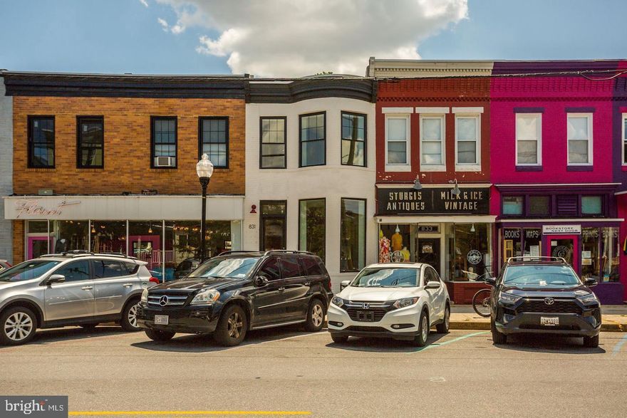 RARE OPPORTUNITY TO OWN THIS OVERSIZED MIXED-USE GEM LOCATED ON 'THE AVENUE' IN THE HEART OF HAMPDEN WITH OFF STREET PARKING. THE MAIN LEVEL CONTAINS A GORGEOUS COMMERCIAL SPACE WITH AN OPEN FLOOR PLAN WHICH INCLUDES KITCHENETTE AND HALF BATH. GLISTENING HARDWOODS CASCADE THROUGHOUT. HIGH CEILINGS. EXPOSED BRICK. DESIGNER LIGHTING. NEST THERMOSTATS AND SMOKE DETECTORS THROUGHOUT. VIDEO SURVEILLANCE AND SECURITY SYSTEM. TONS OF STORAGE. THE SECOND LEVEL INCLUDES A 2 BEDROOM 1 FULL BATH APARTMENT. SS APPLIANCES. TONS OF NATURAL LIGHT. WALK-IN SHOWER. WALK-IN CLOSETS. EXPANSIVE TREX DECK FOR ENTERTAINING WITH INCREDIBLE CITY VIEWS. SEPARATE UTILITIES FOR EACH FLOOR. CLOSE PROXIMITY TO RETAIL SHOPPING, LOCAL DINING, AND ALL MAJOR HIGHWAYS. SCHEDULE A PRIVATE TOUR TODAY.
