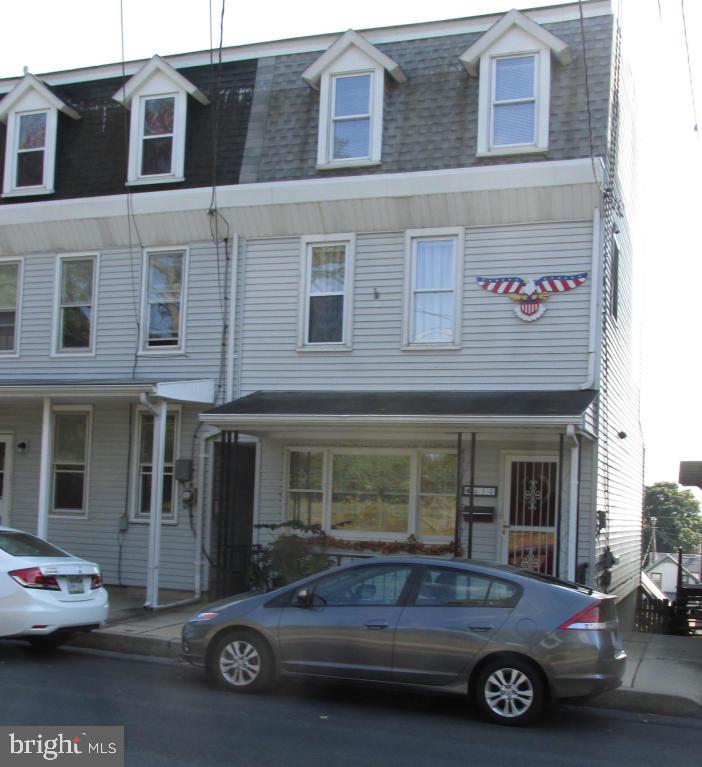 Beautifully maintained home shows pride of ownership. Home has repacement windows, new carpet in living room, beautiful red oak kitchen, 4 bedrooms and more!